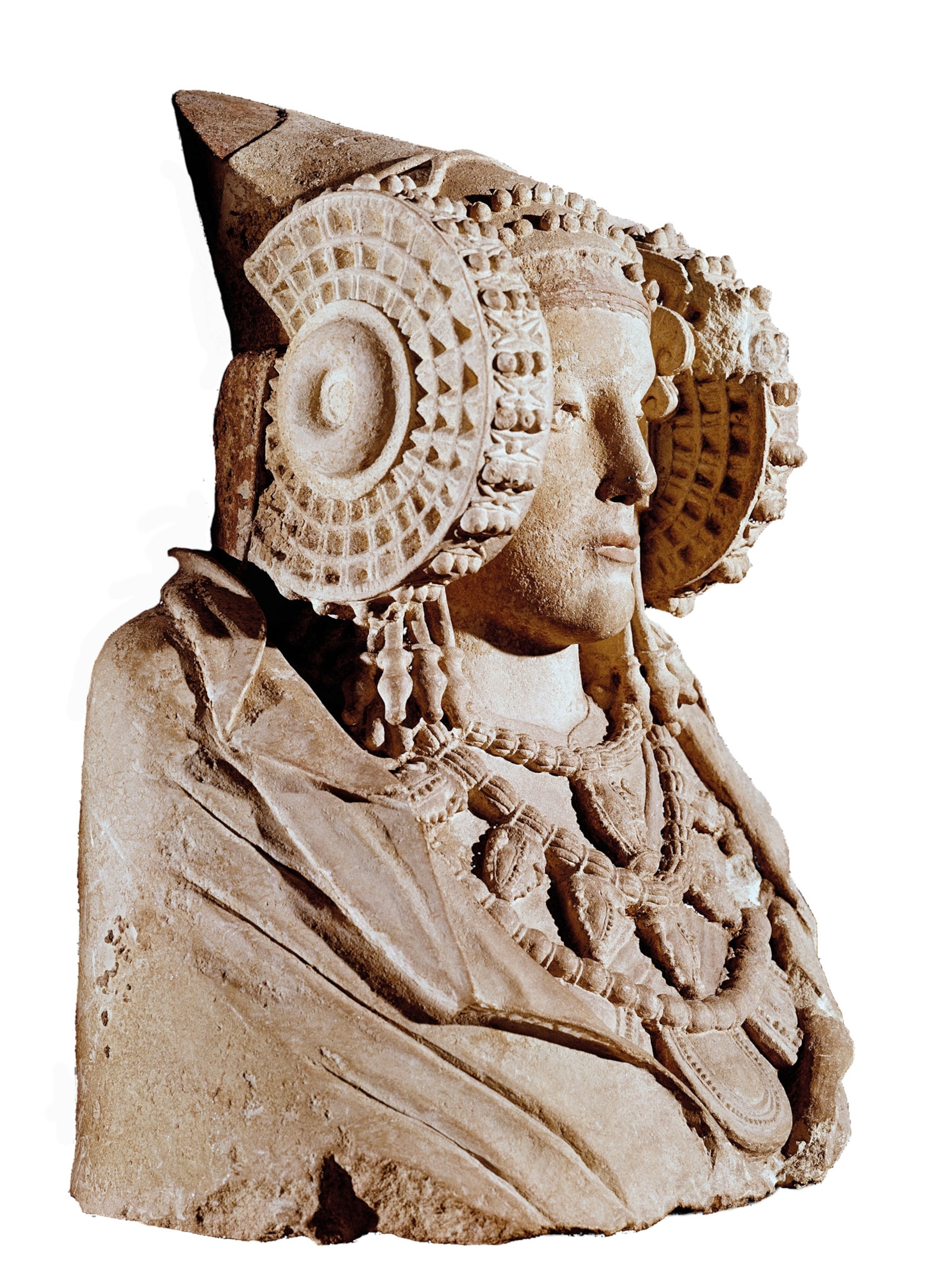 A bust of a woman wearing a large headdress and necklaces