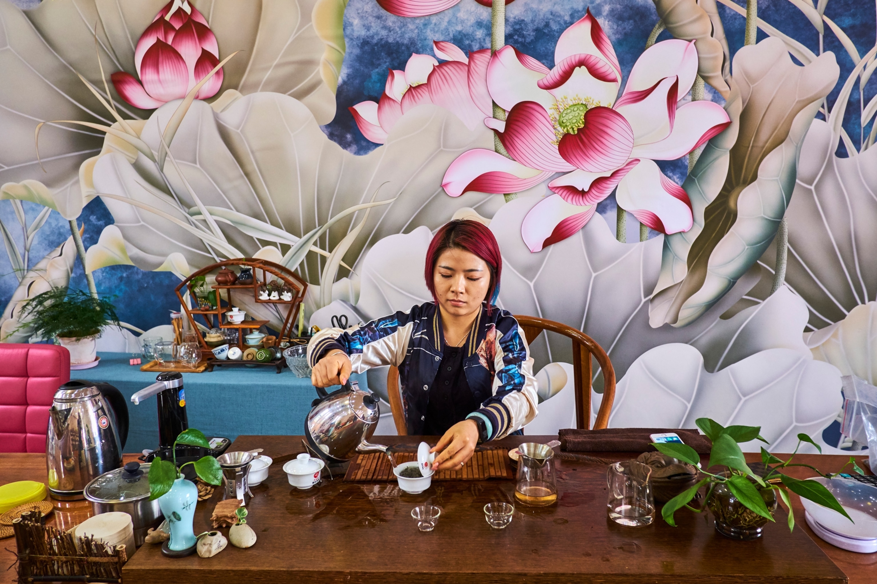 a tea ceremony in tea shop, Xishuangbanna district, Yunnan, China