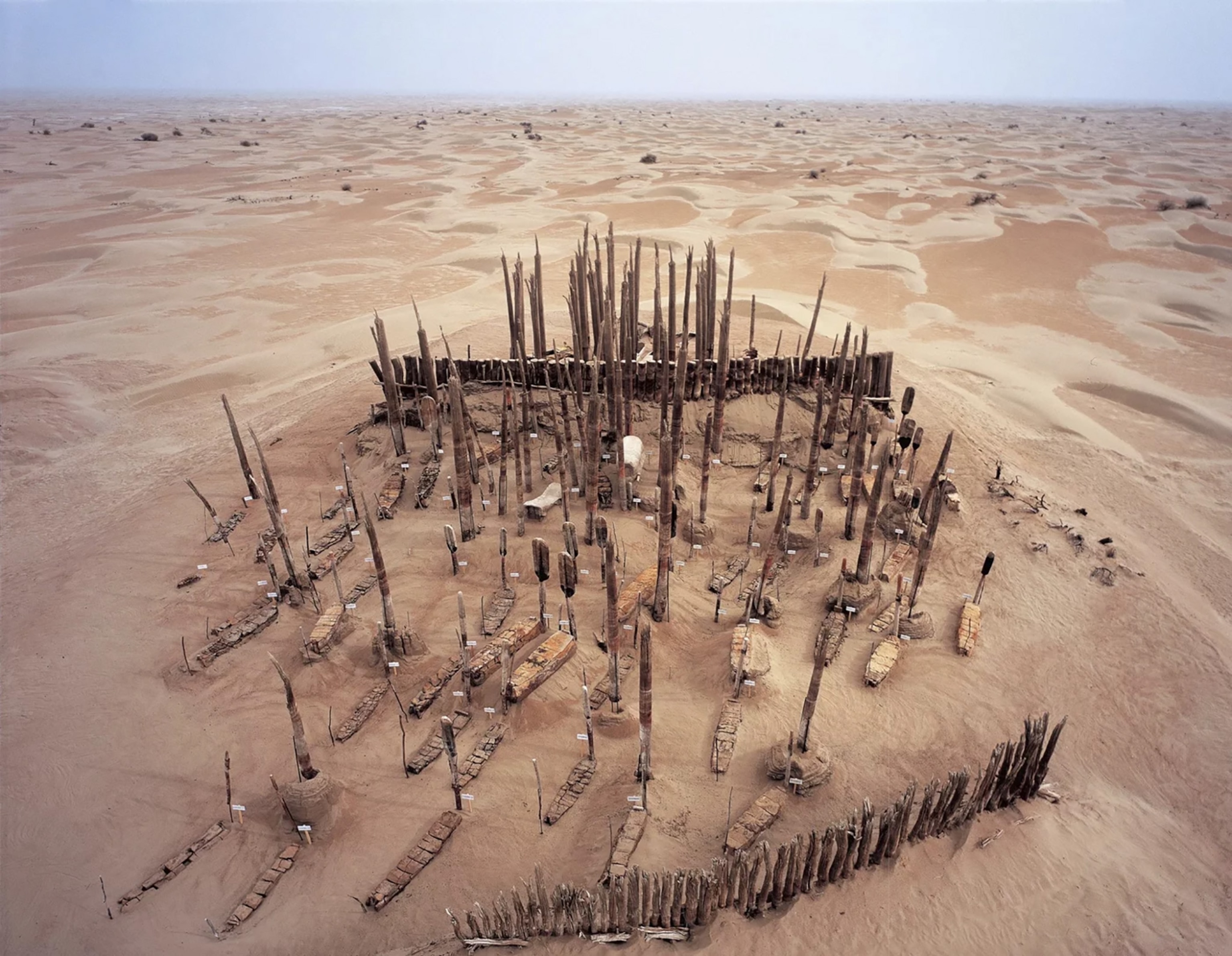 aerial view of a cemetery that marks graves using upright paddles