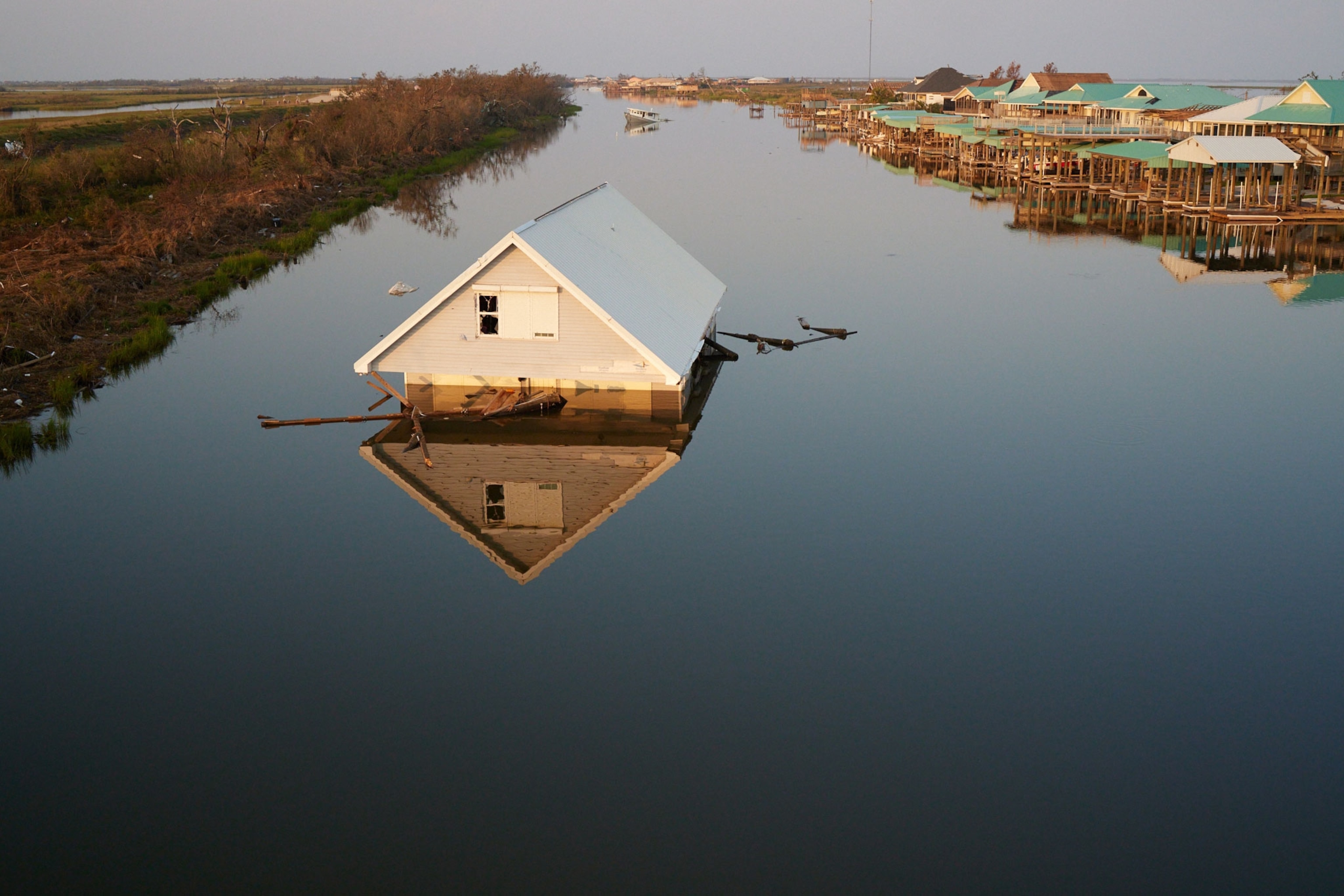 A submerged house in Cocodrie, Louisiana after Hurricane Ida
