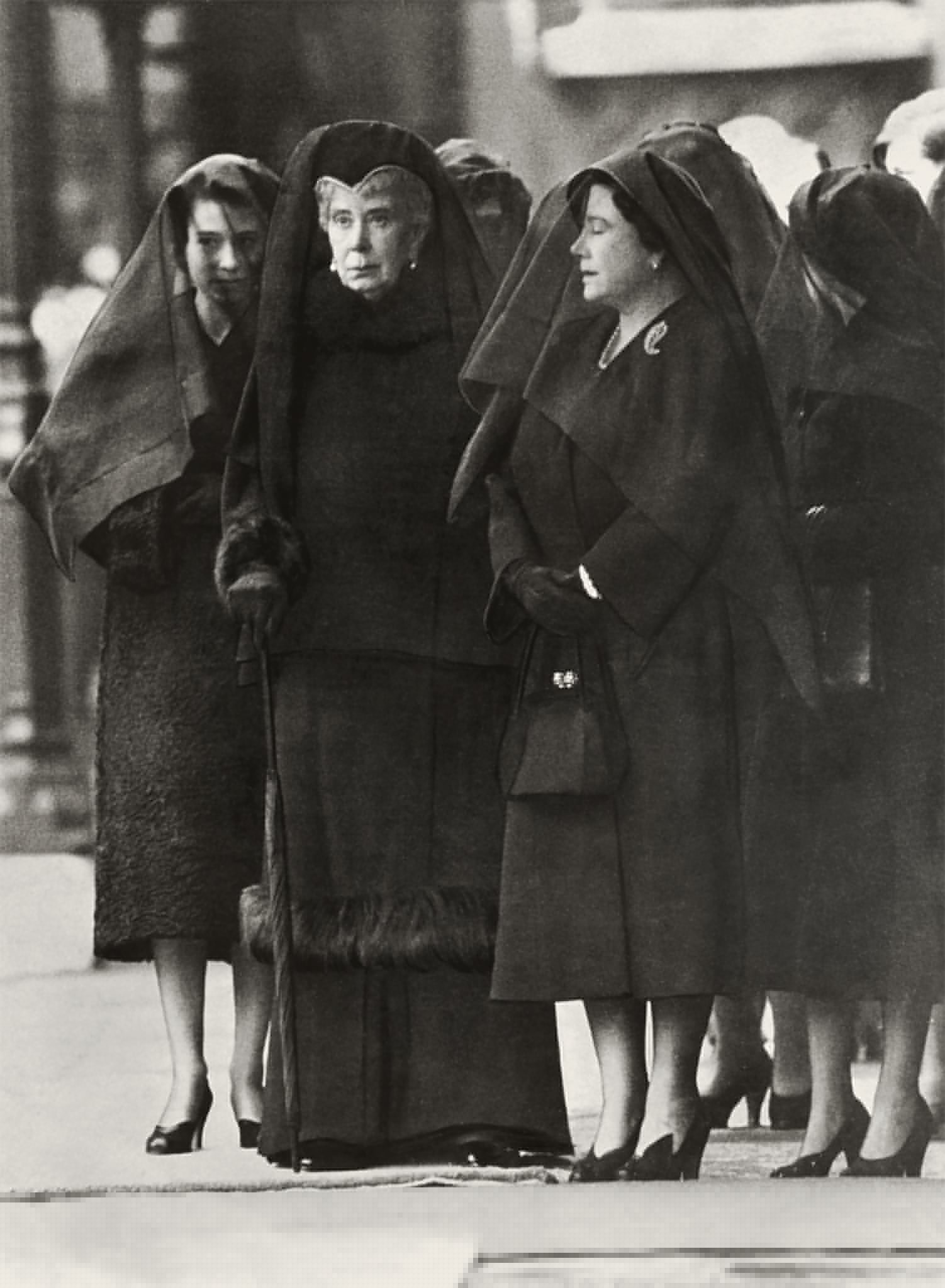 Three generations of queens—(from left) the newly minted Elizabeth II, Queen Mary, and Elizabeth the Queen Mother—mourn George VI together in 1952.