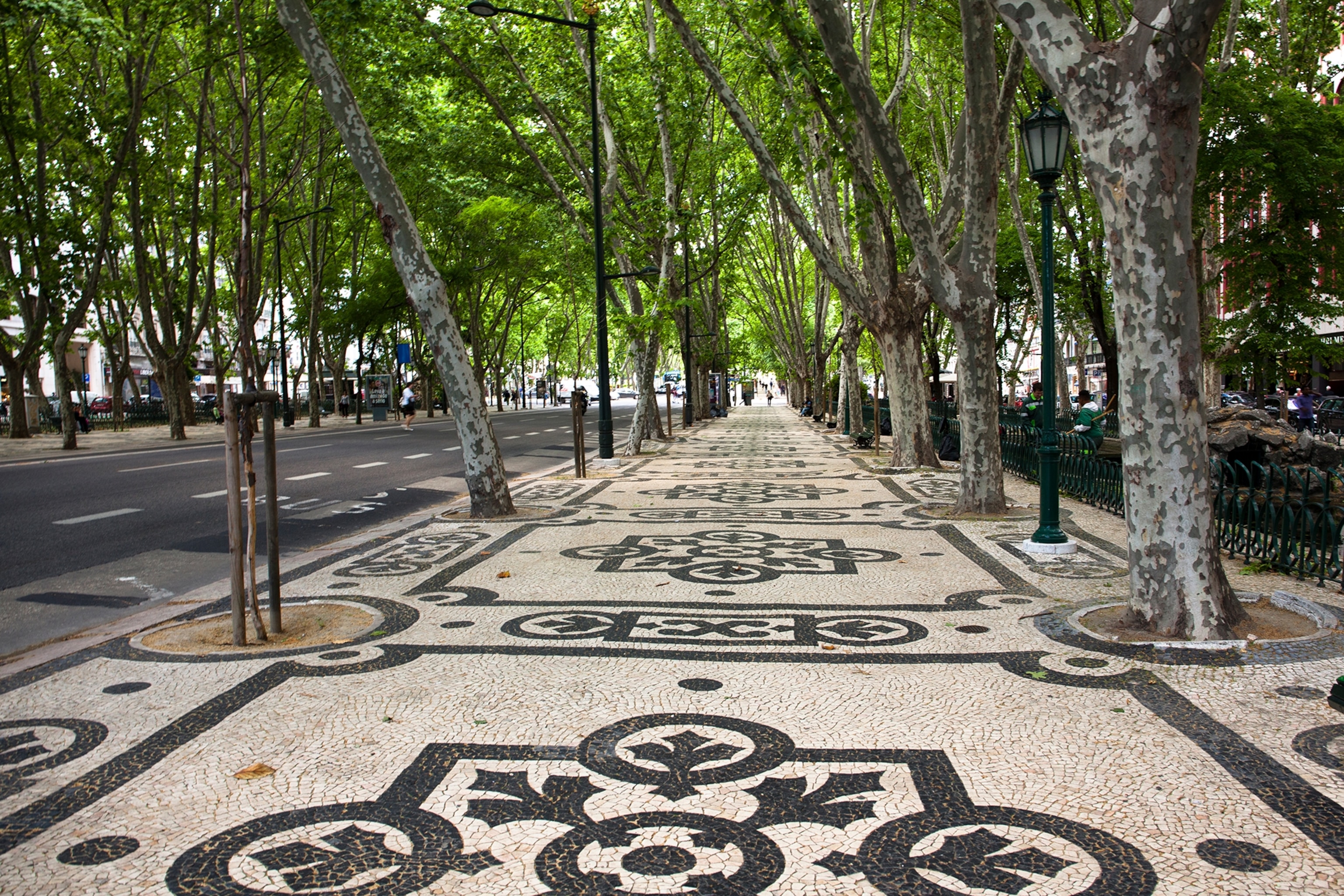 Avenida da Liberdade is an important avenue in central Lisbon. It is paved with Portuguese pavement which consists of small flat pieces of various different stones, arranged to form a pattern or picture, like a mosaic