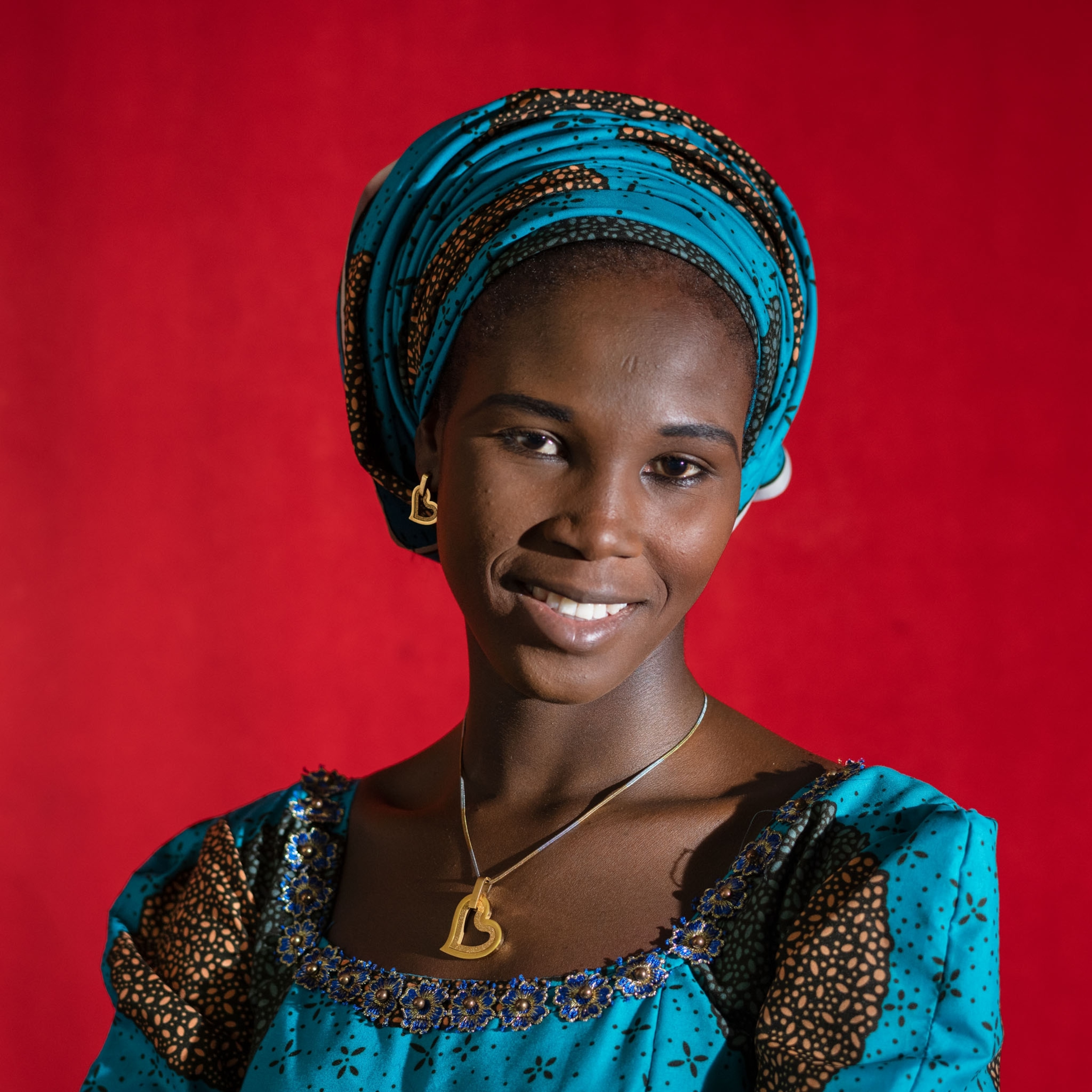 a young woman smiling for a portrait
