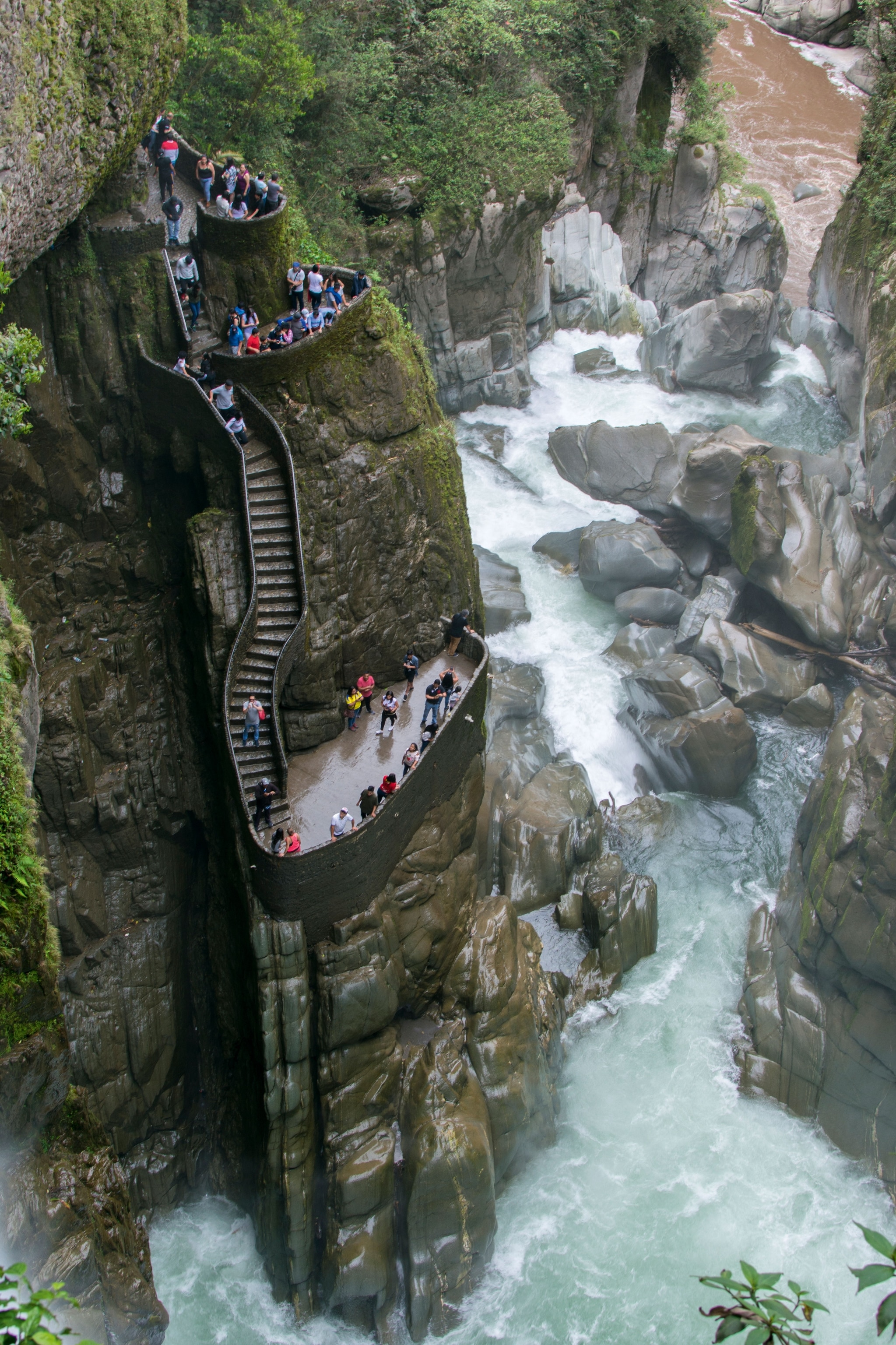 Tourists overlooking a Waterfall near Banos