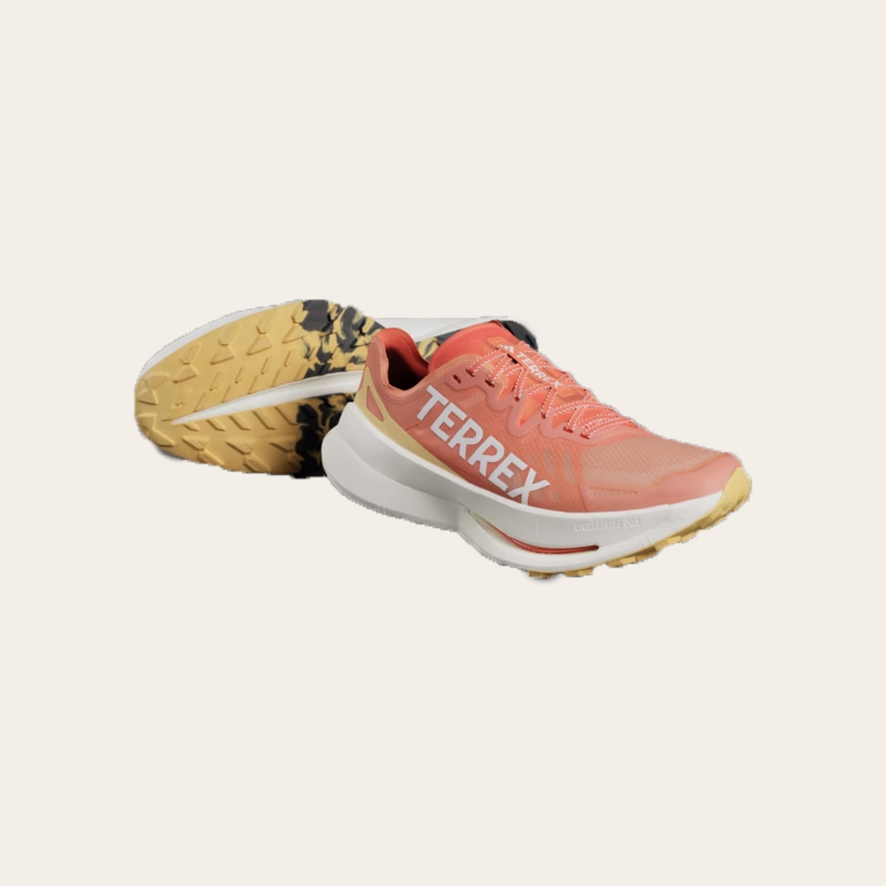 Adidas Men's Terrex Agravic Speed trail running shoes in orange.