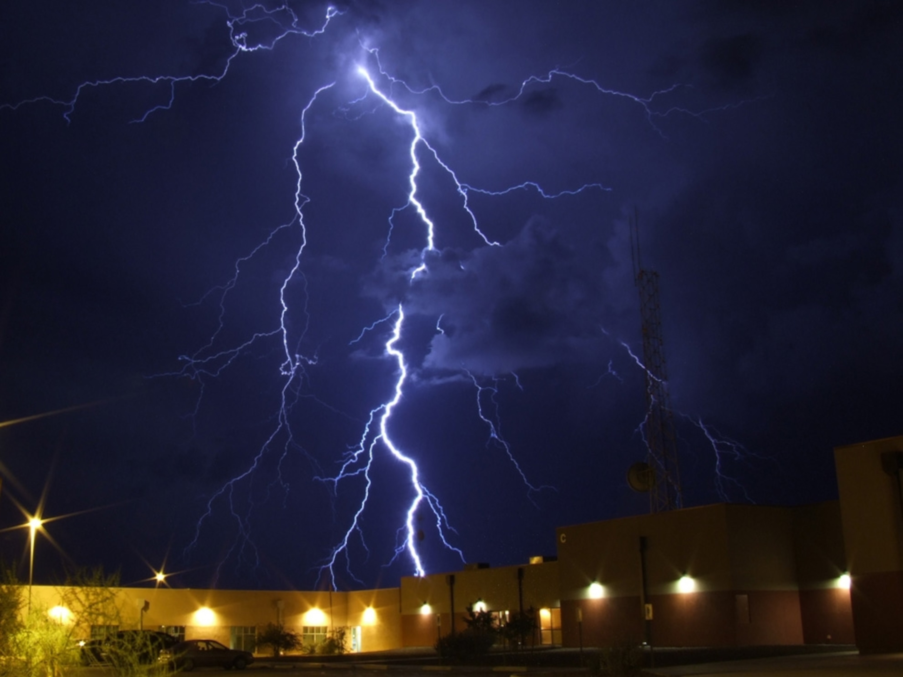 Lightning strikes the ground behind the Cochise County courthouse in Arizona