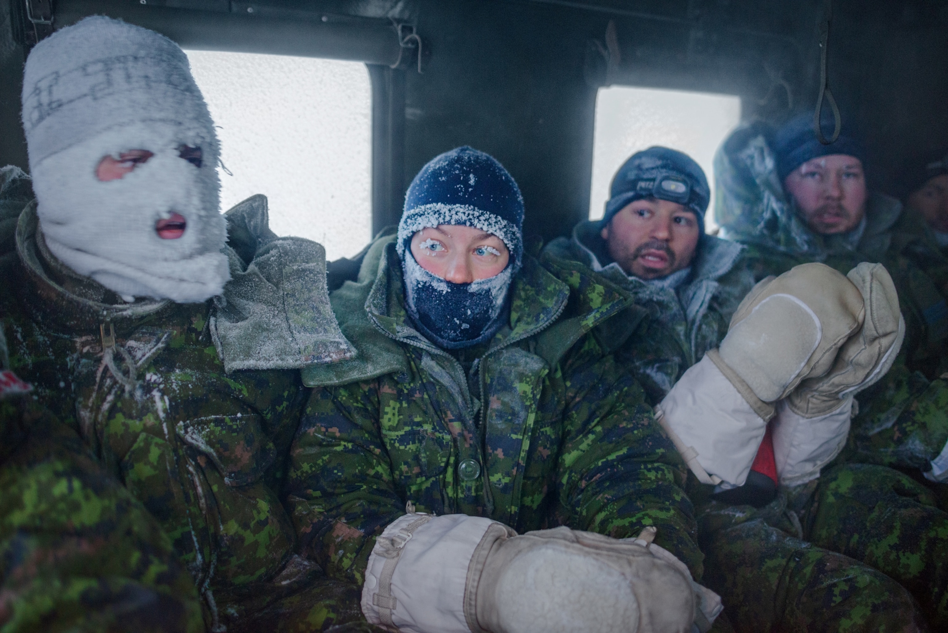 soldiers with faces covered with ice.