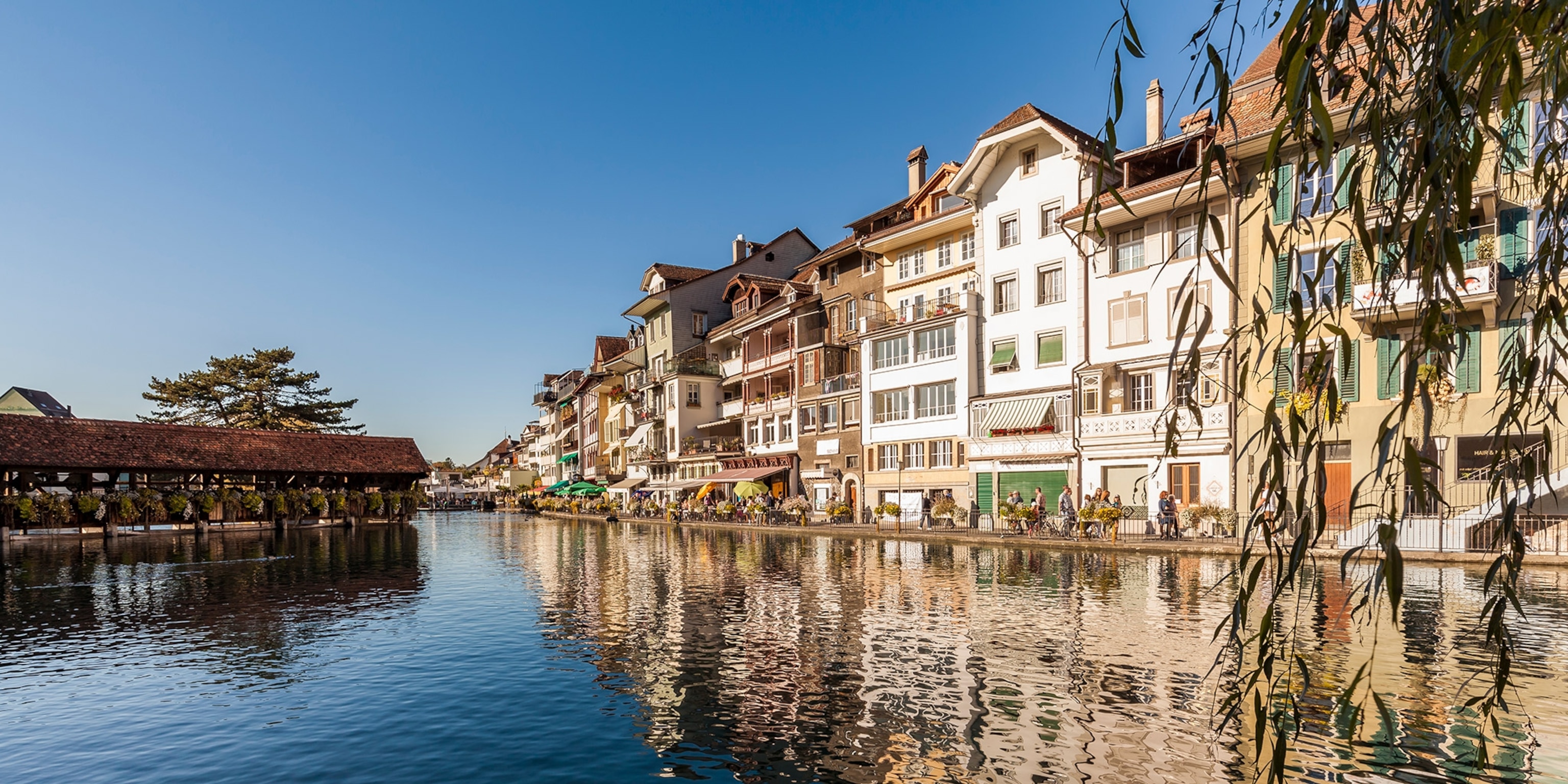 Town is photographed from the river.