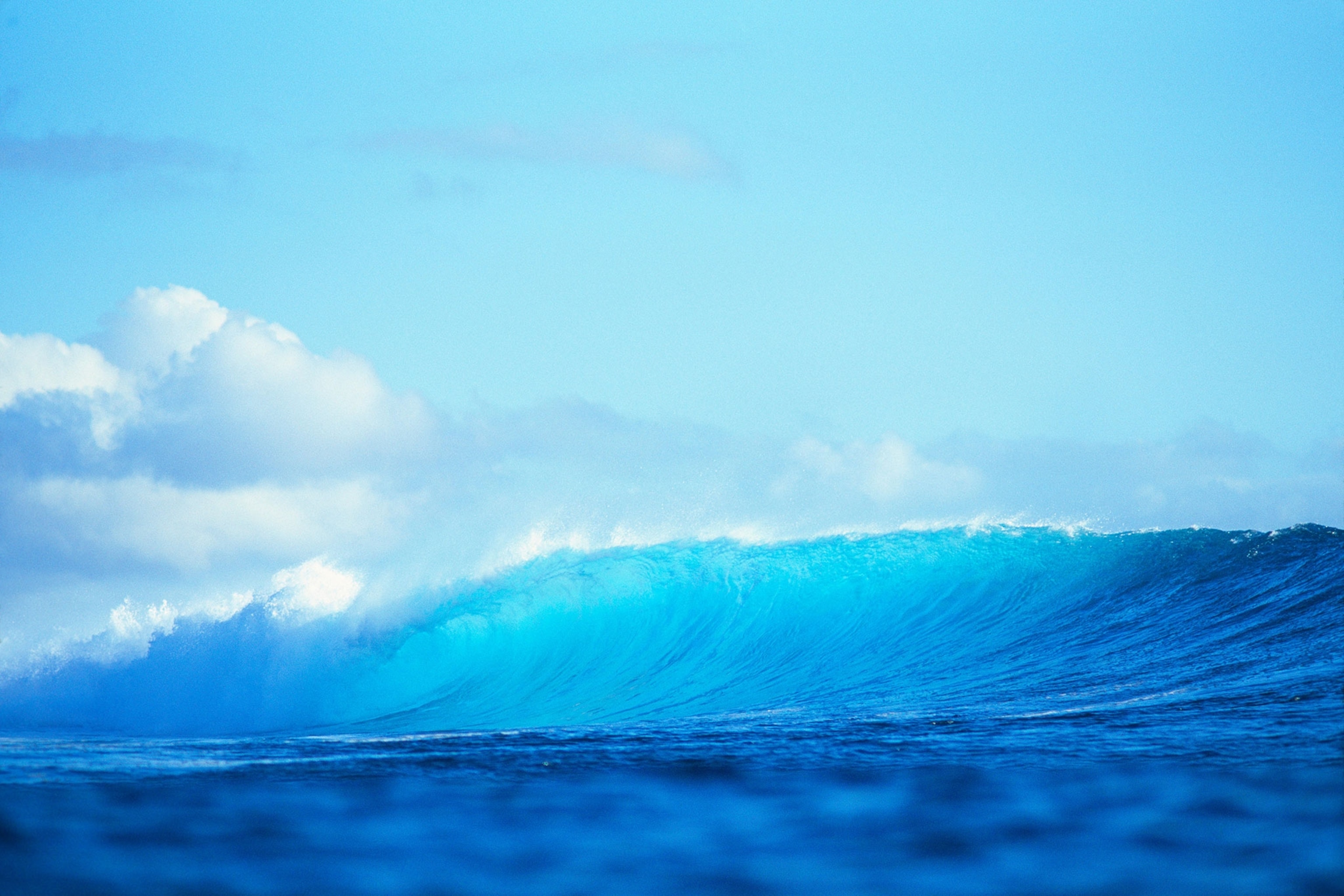 a large wave breaking in Fiji