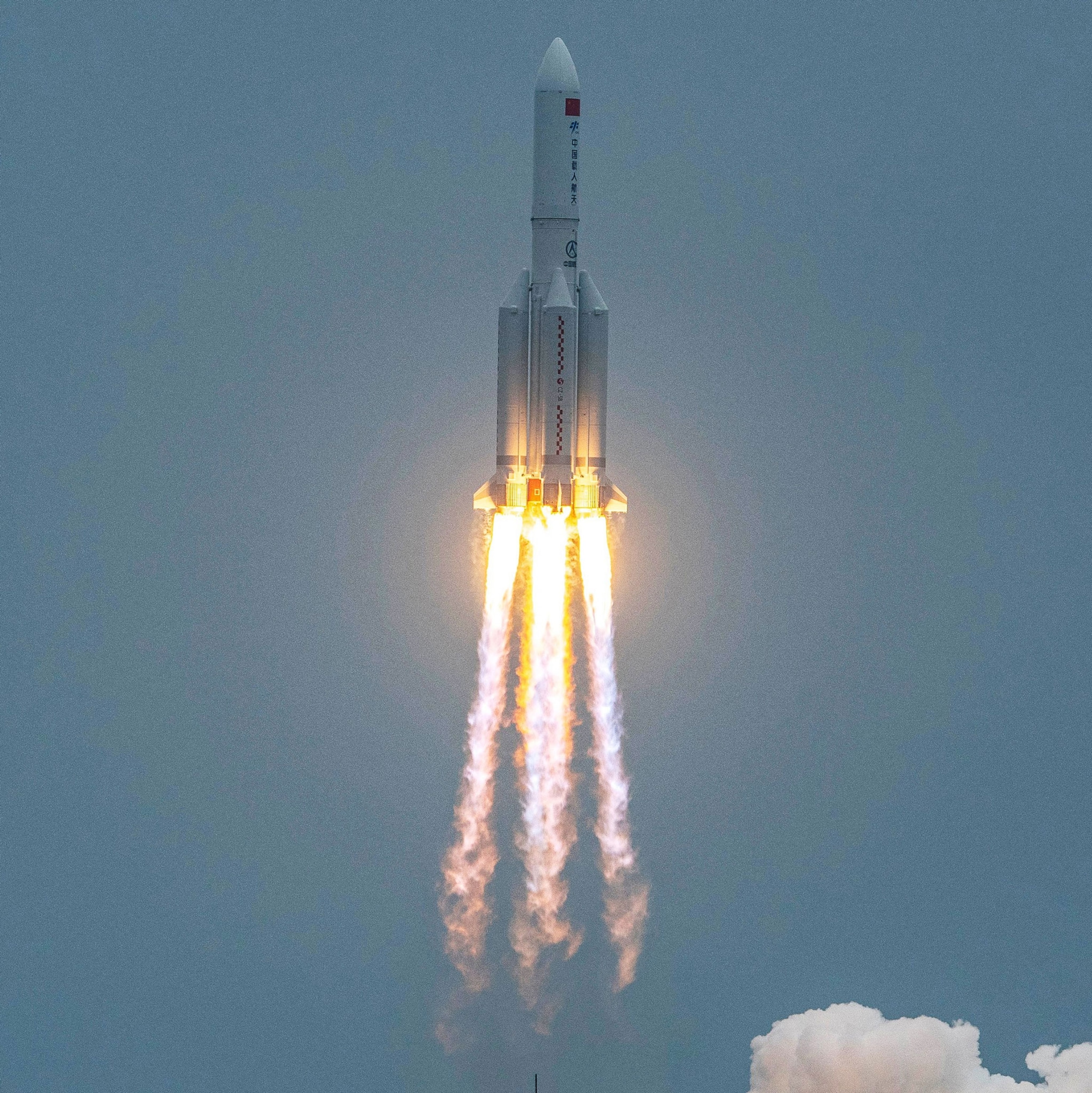 China launches a rocket carrying first module of its new space station into low Earth orbit.
