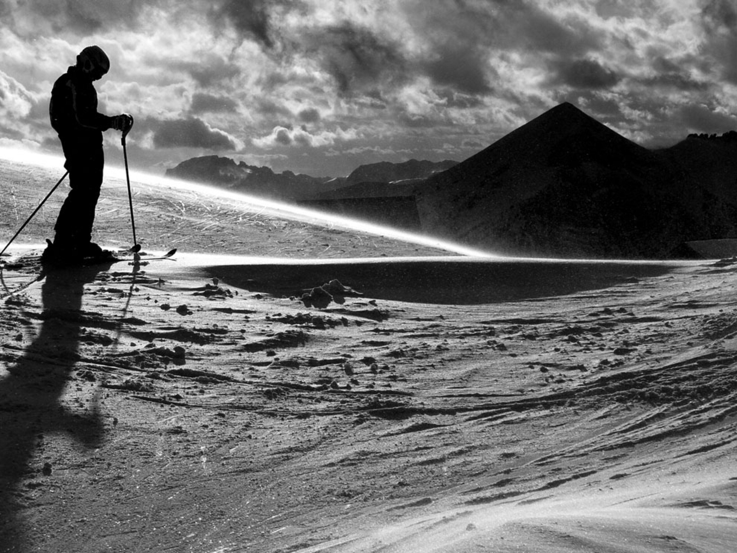 Skier pausing near the end of the day