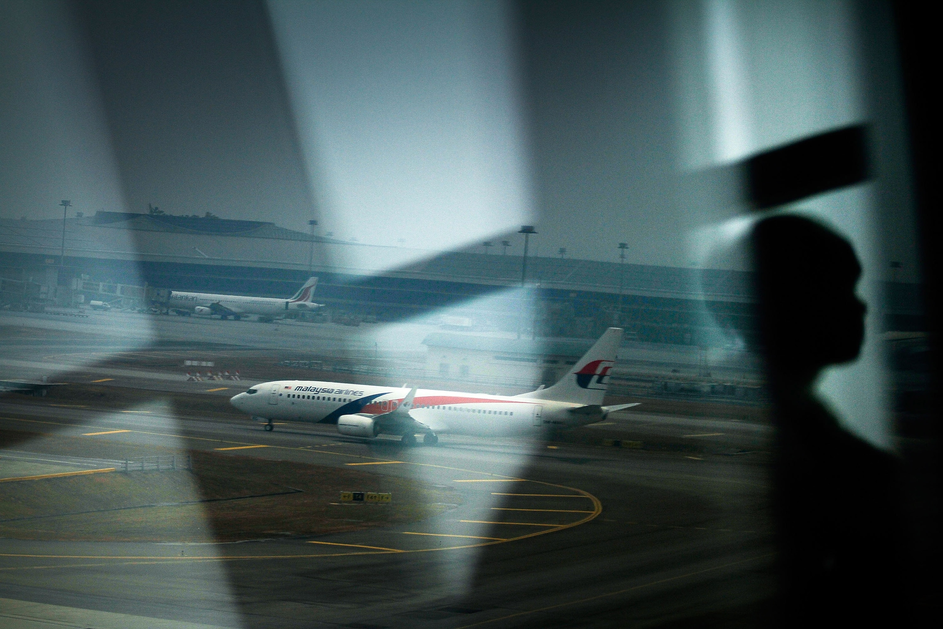 A Malaysia Airlines plane on the tarmac at Kuala Lumpur International Airport