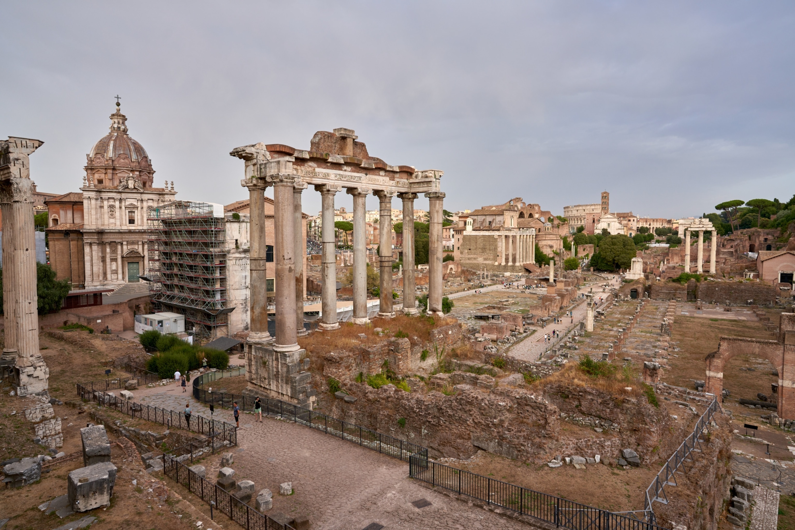 An elevated view across the partially-preserved ruins of the Roman Forum