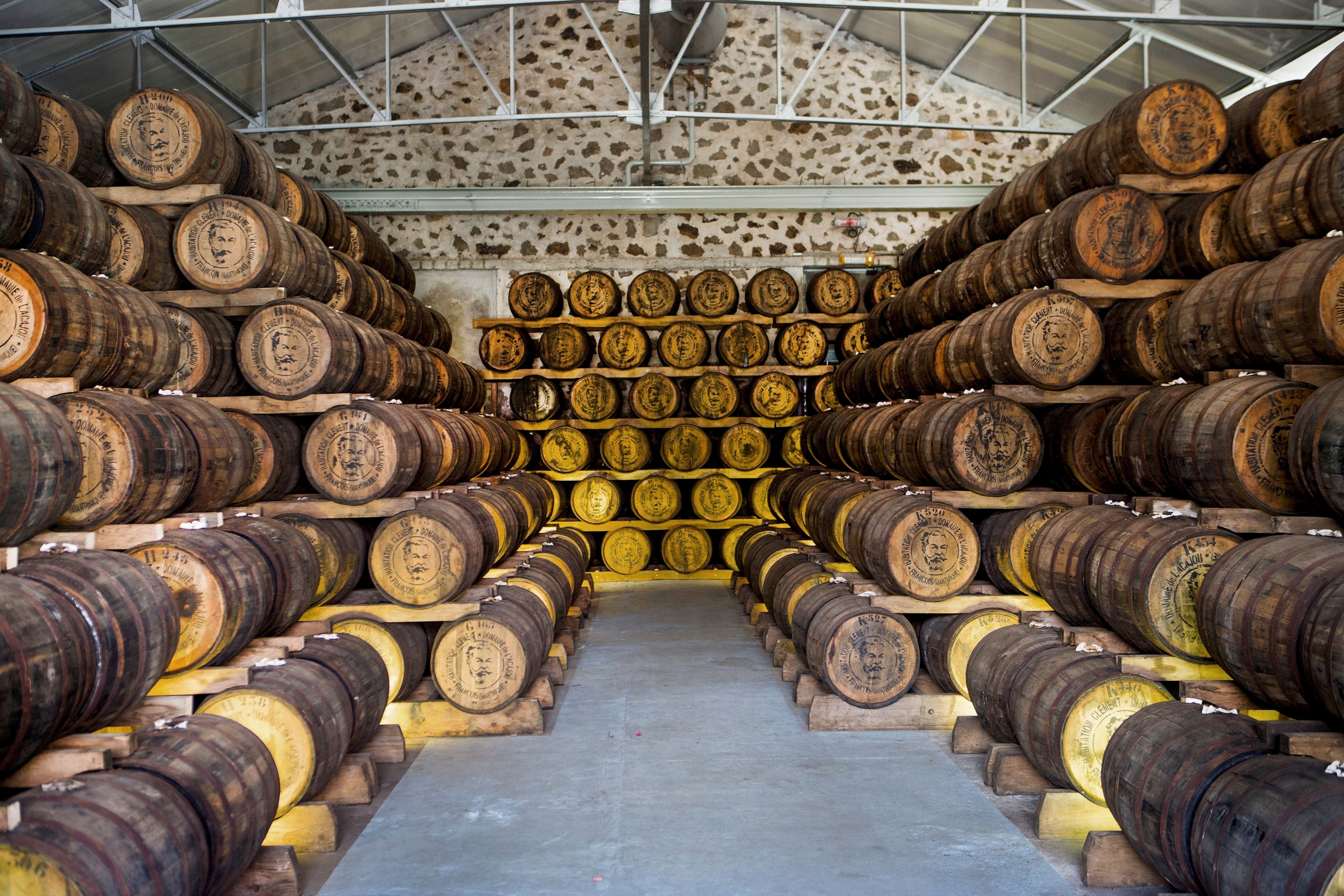 barrels of rum stored inside the Habitation Clement warehouse in Le Marin, Martinique