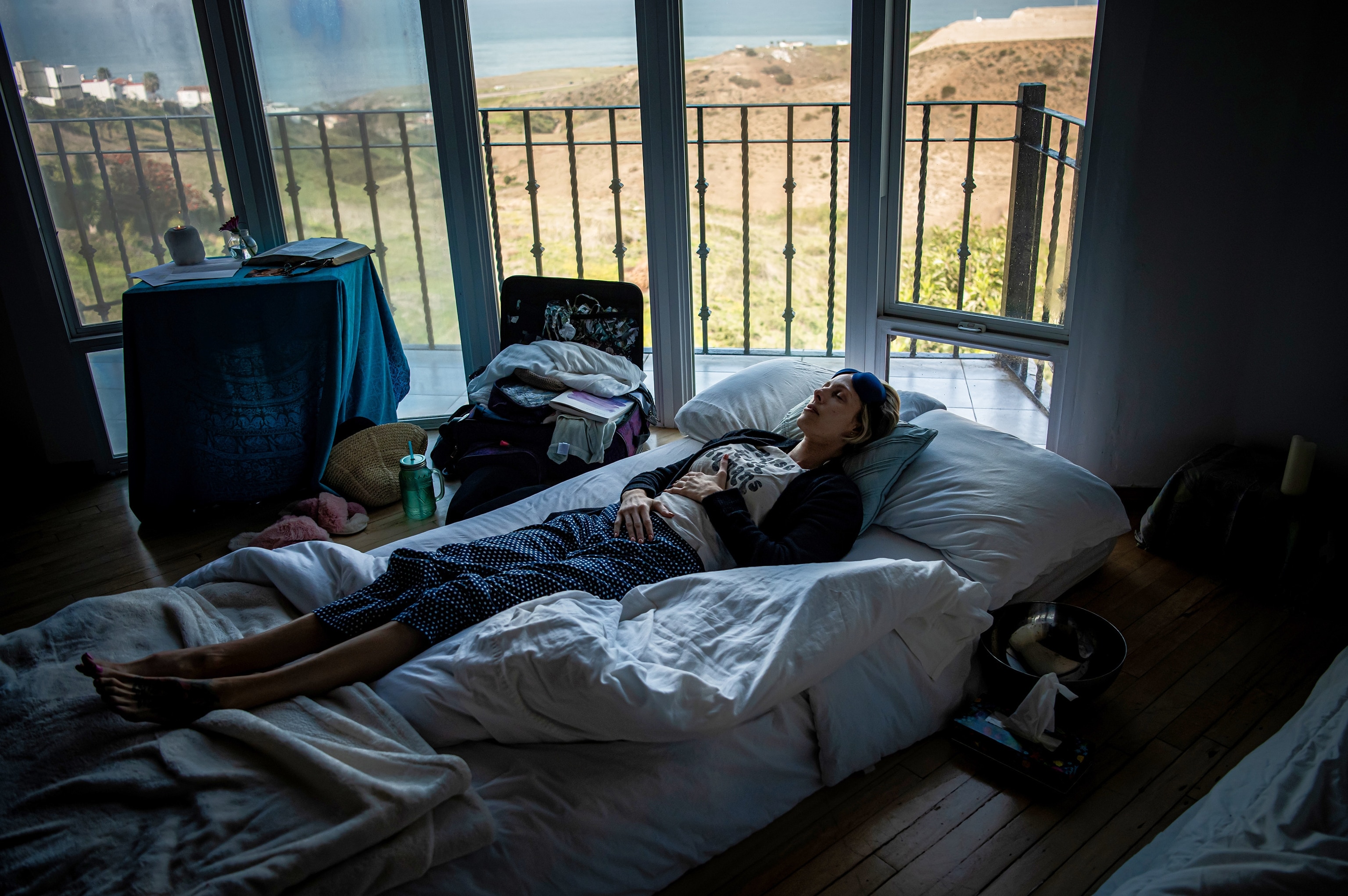 Jenna Lombardo-Grosso, a former Marine relaxes after drinking psilocybin mushroom tea with others at a Missions Within psychedelic therapy retreat on the outskirts of Tijuana, Mexico