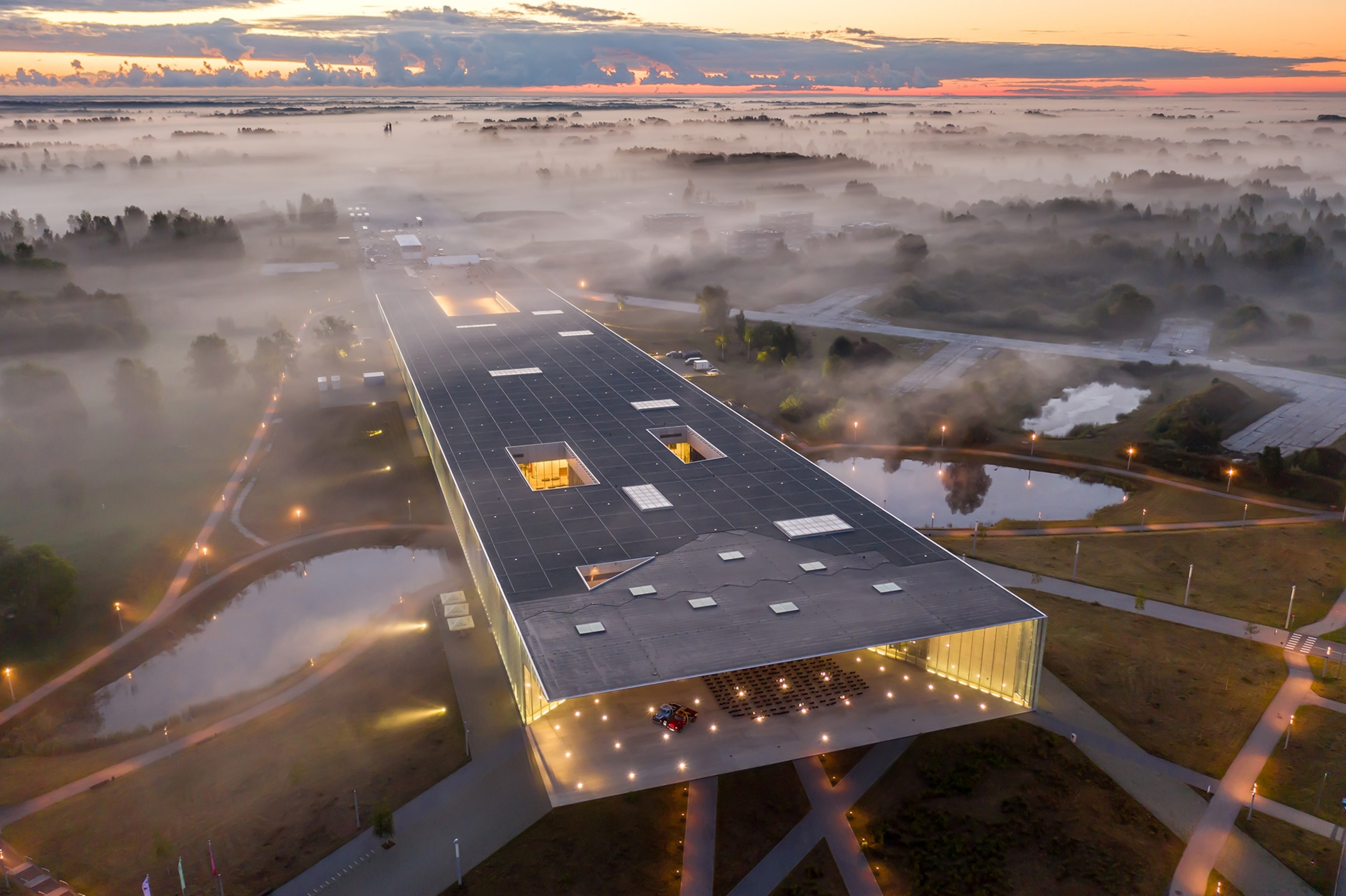 Foggy morning sunrise over Estonian National Museum.