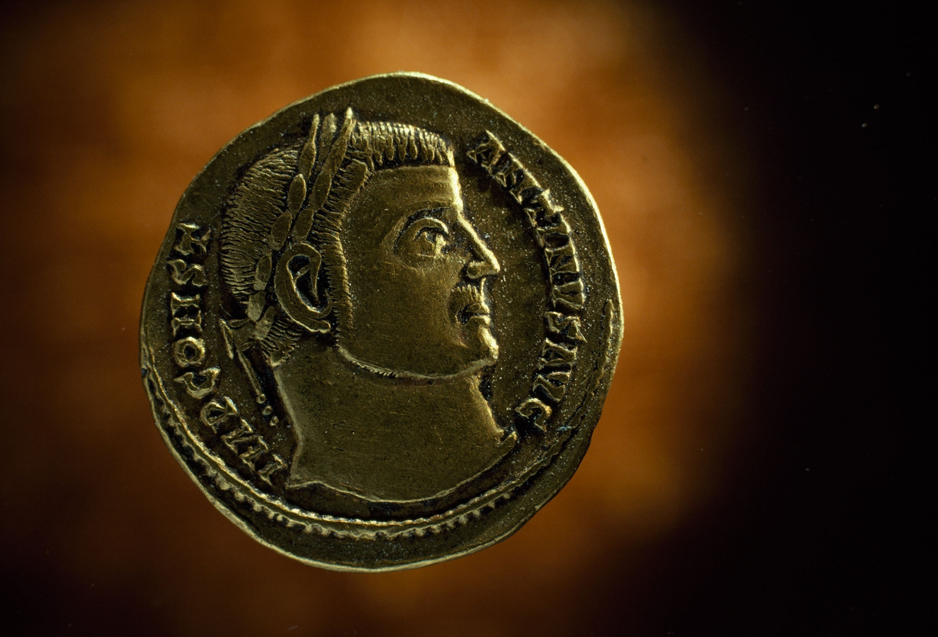A roman coin with a profile of Constantine carved on it