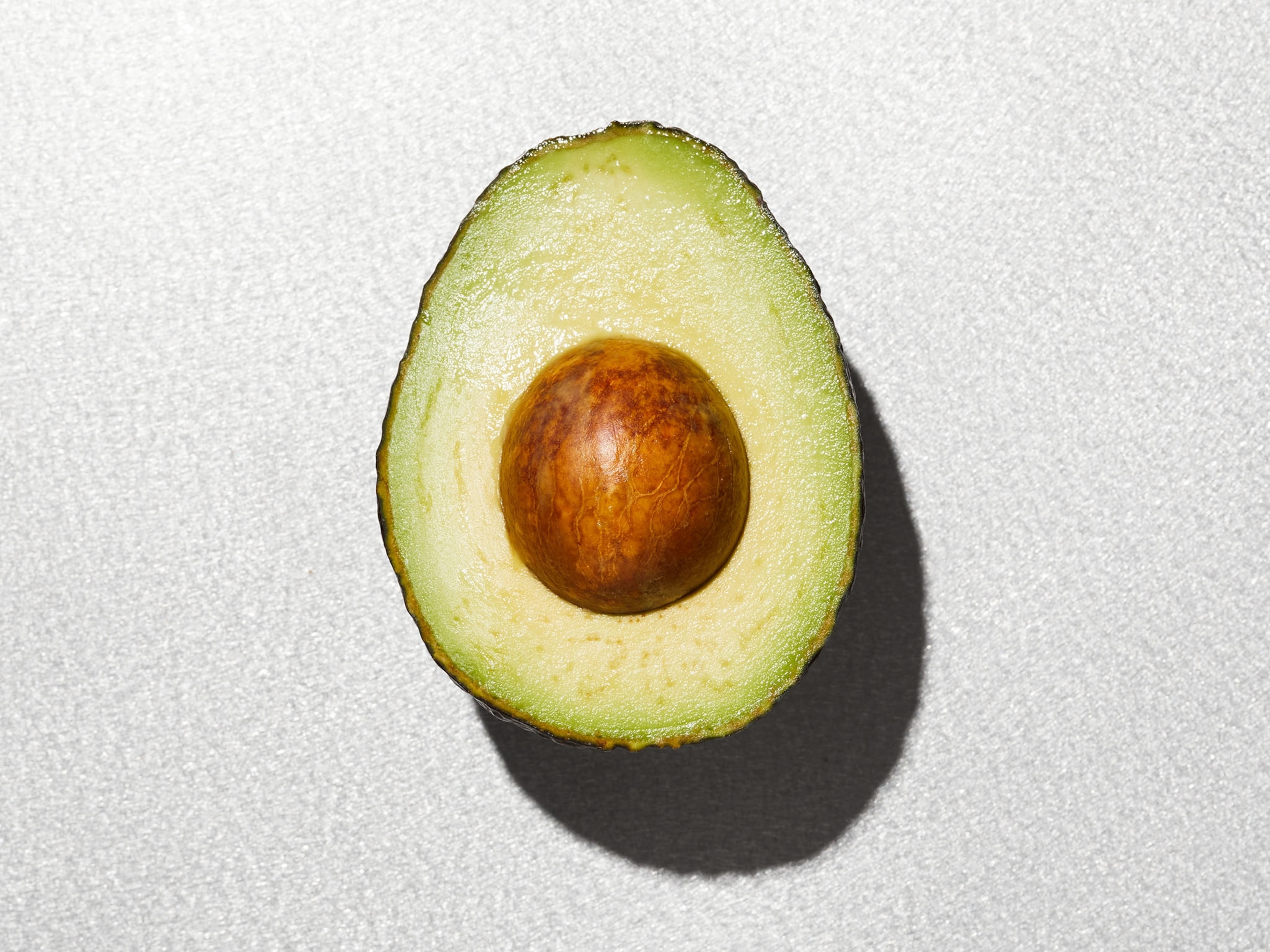 an avocado cut in half