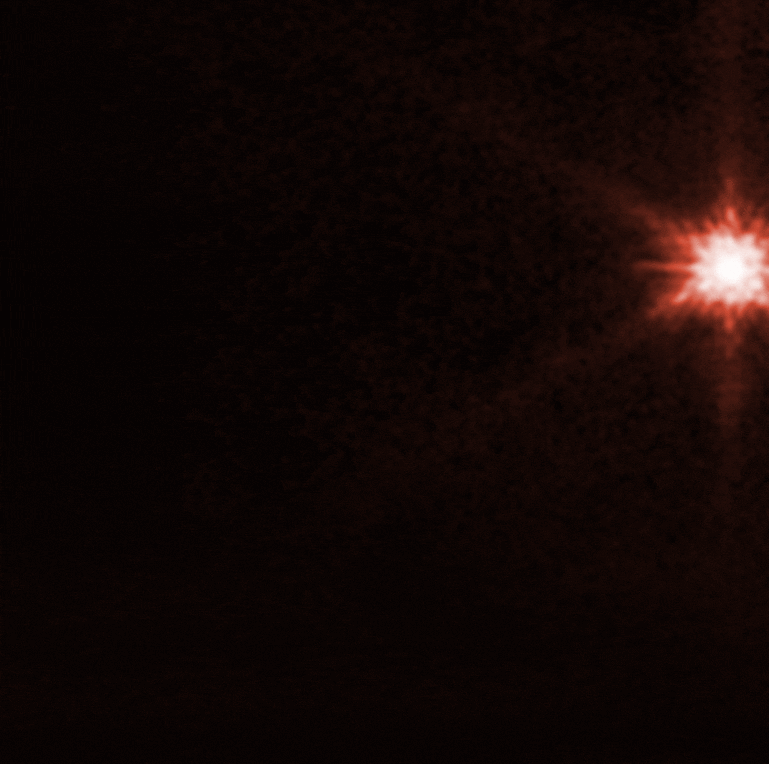 A timelapse of images showing a red plums coming off a glowing body in space.