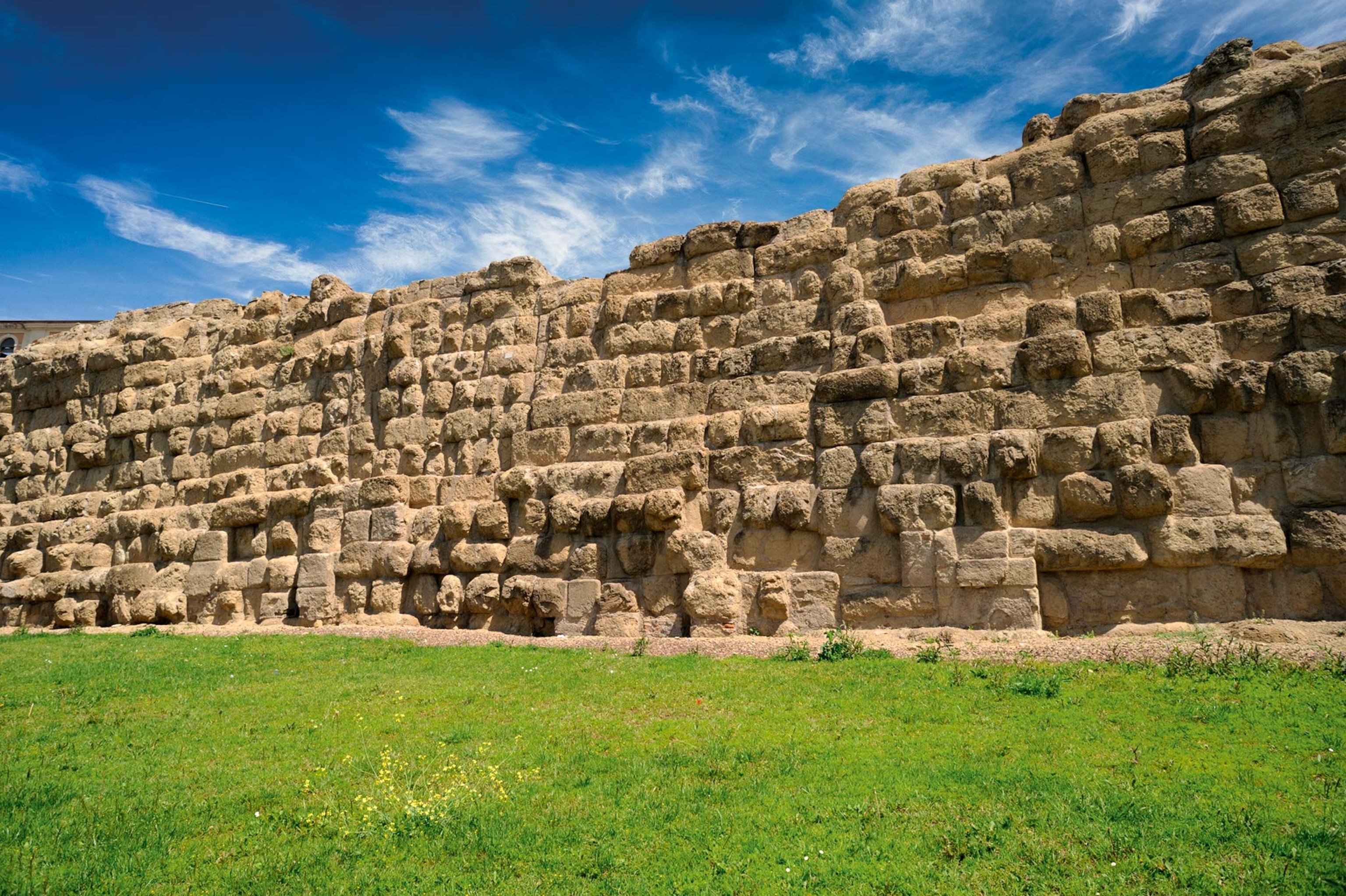In the Piazza dei Cinquecento in Rome stands a section of wall that, according to Livy, replaced the one commissioned by Tullius around 378 B.C. It was some 33 feet high and more than 13 feet thick.
