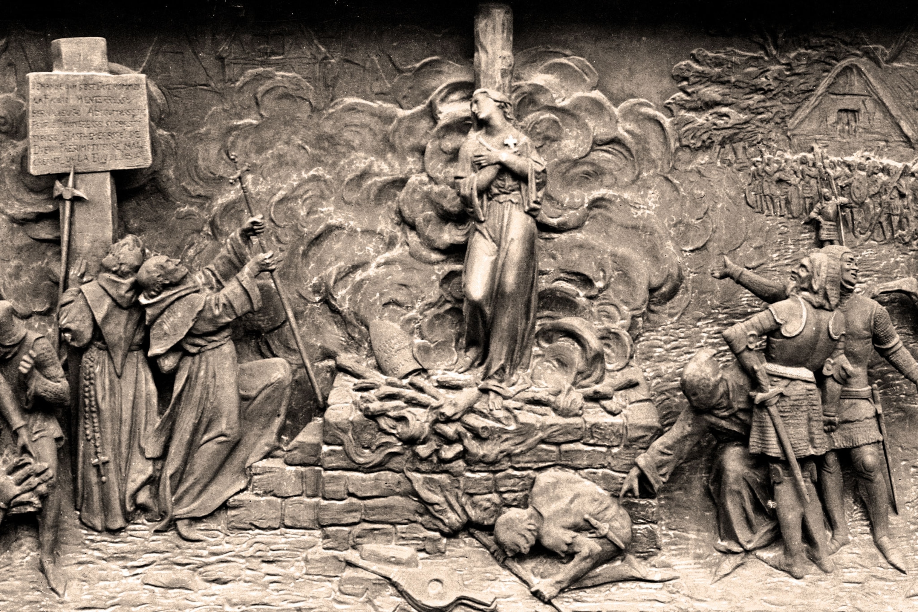 a bas-relief depicting Joan of Arc being burned at the stake