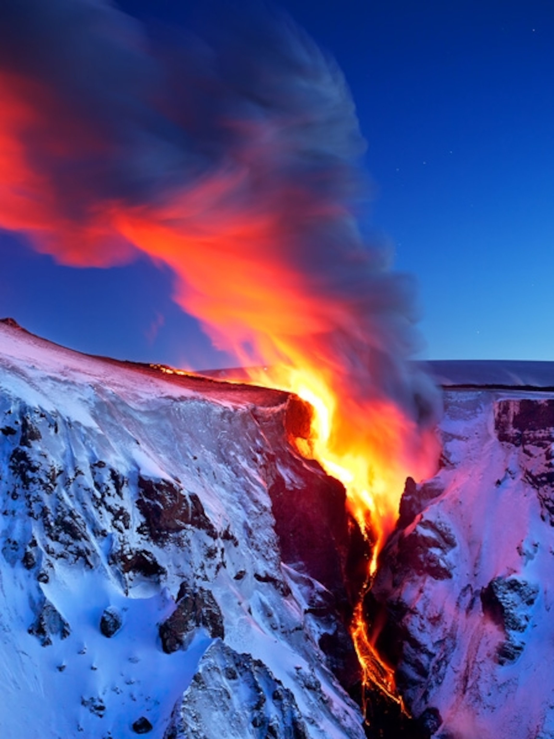 Lava flowing down an icy rock face