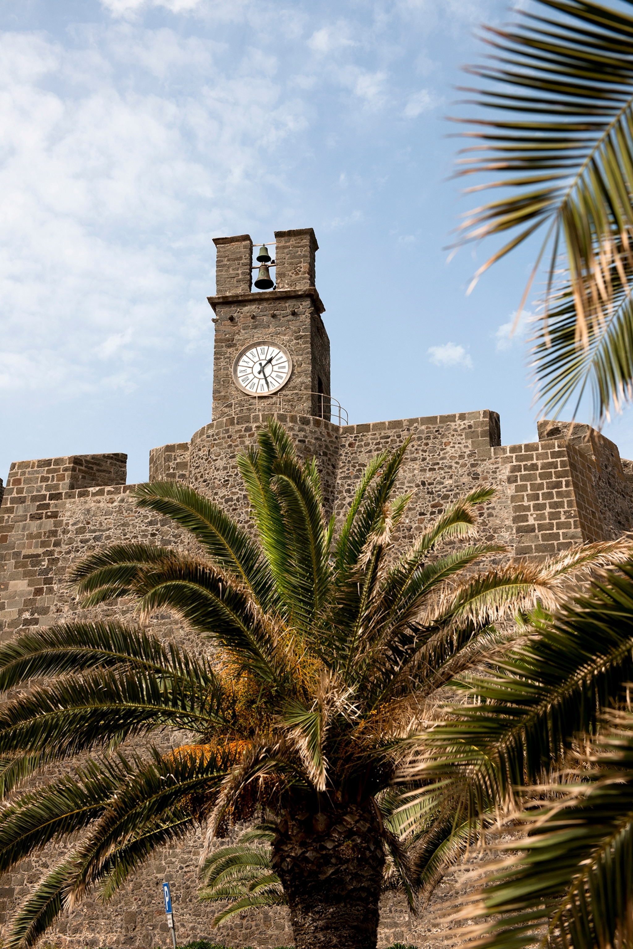 Italy Province of Trapani Pantelleria Mediterranean Volcanic island Pantelleria town Dammuso castle Tiziana Clock tower Palm trees Europe travel travel