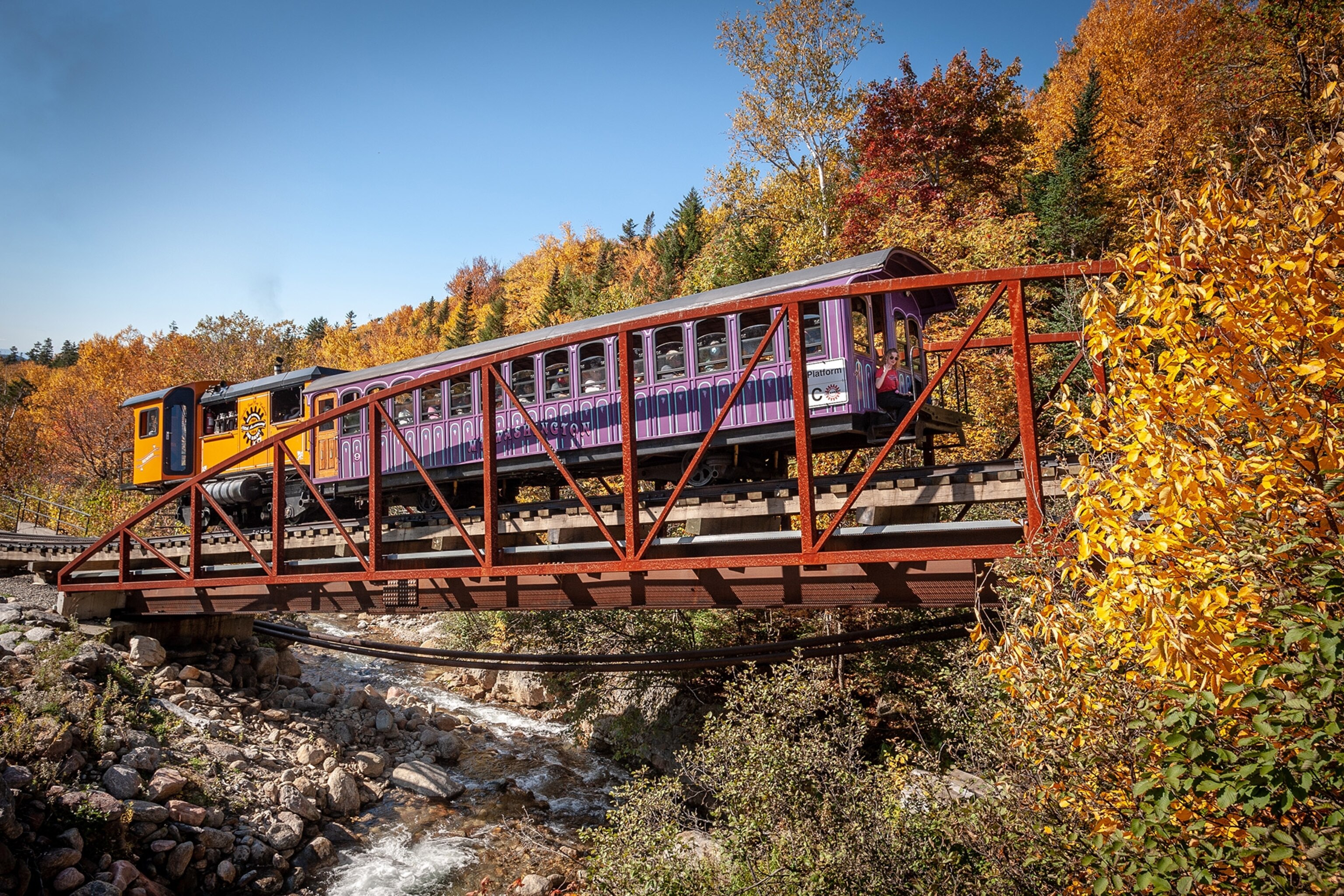 Scenic photo of the Cog train in fall foliage
