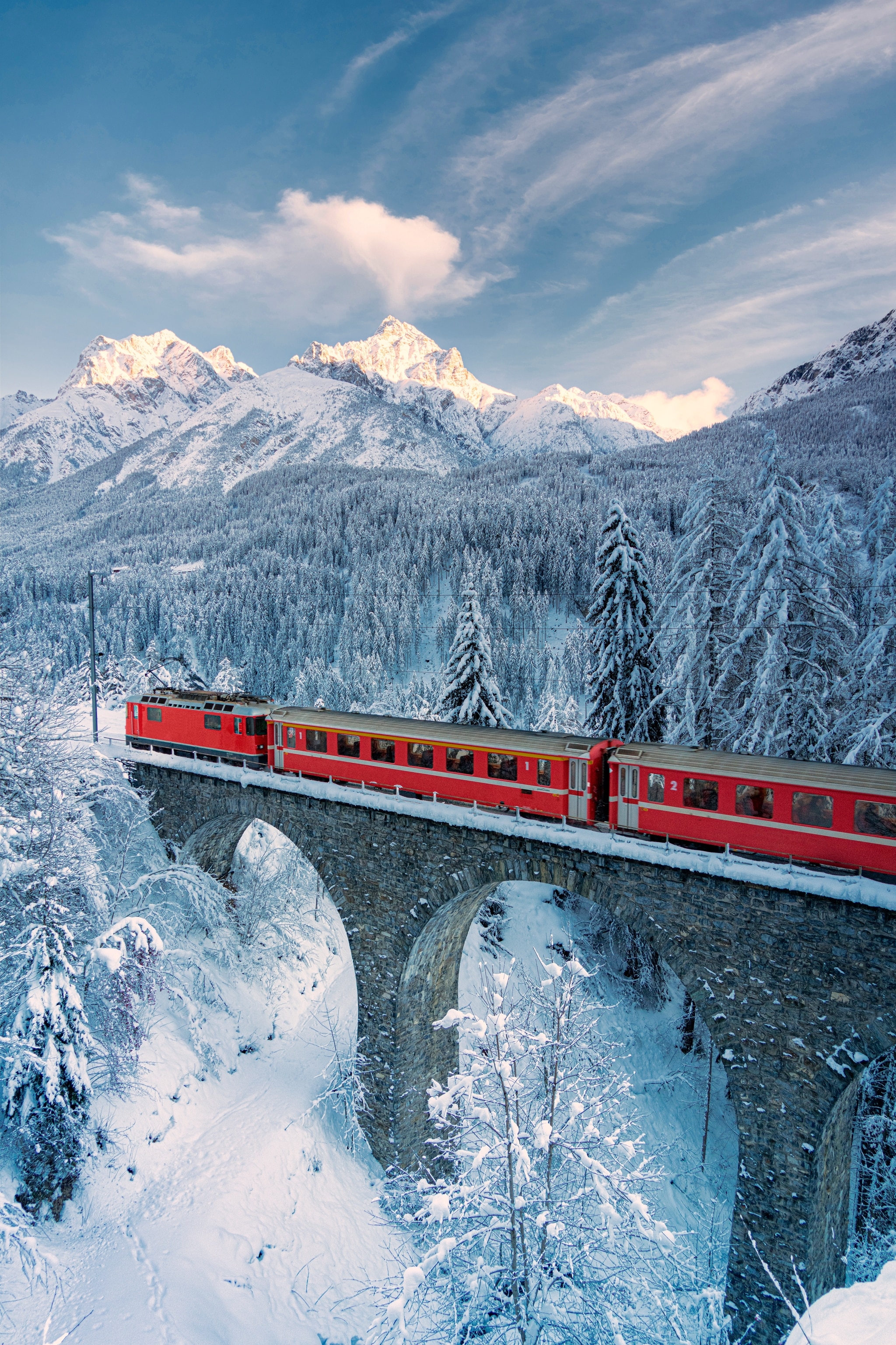 train going through mountains