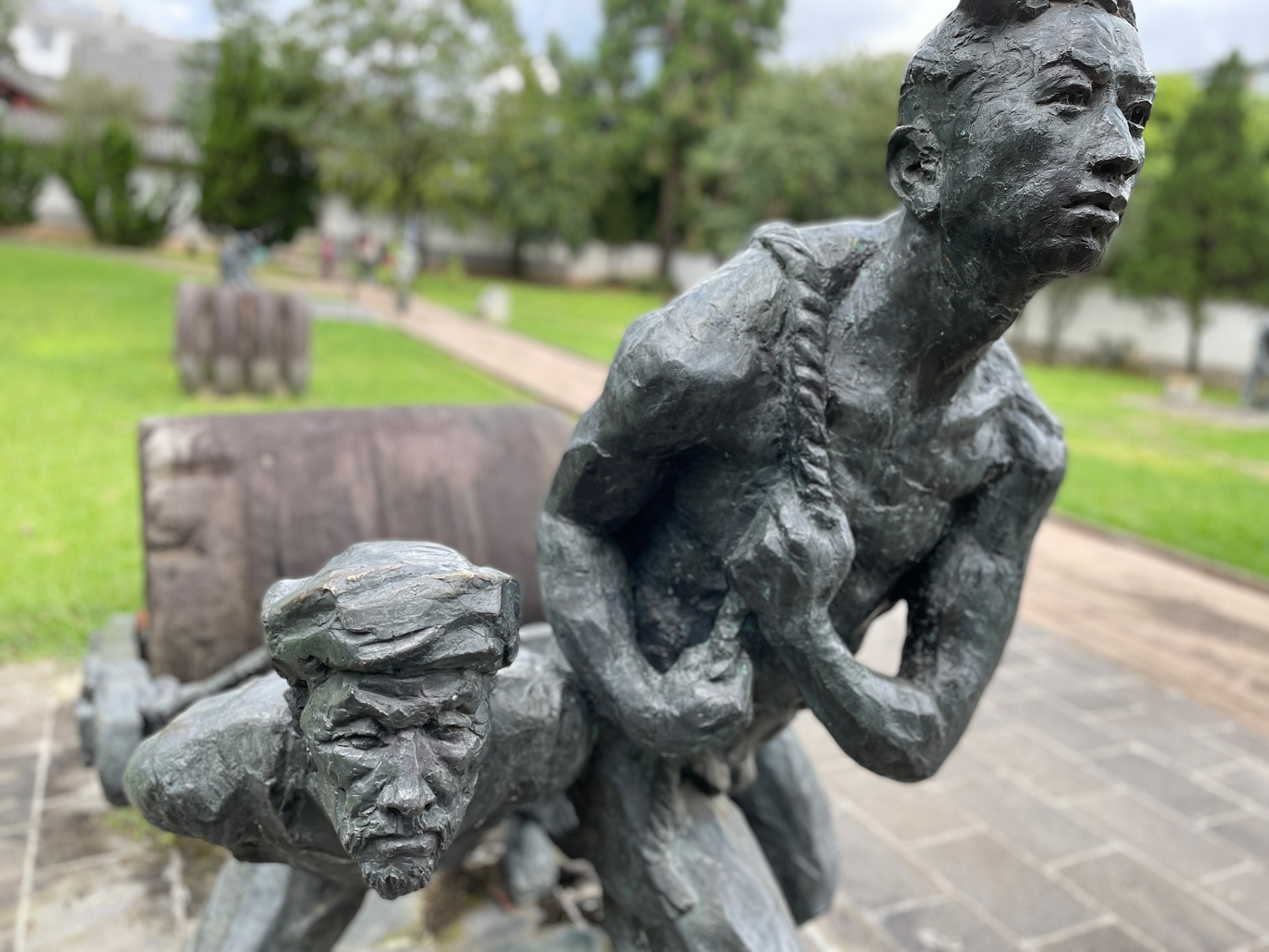 Photo of sculpture of two men working