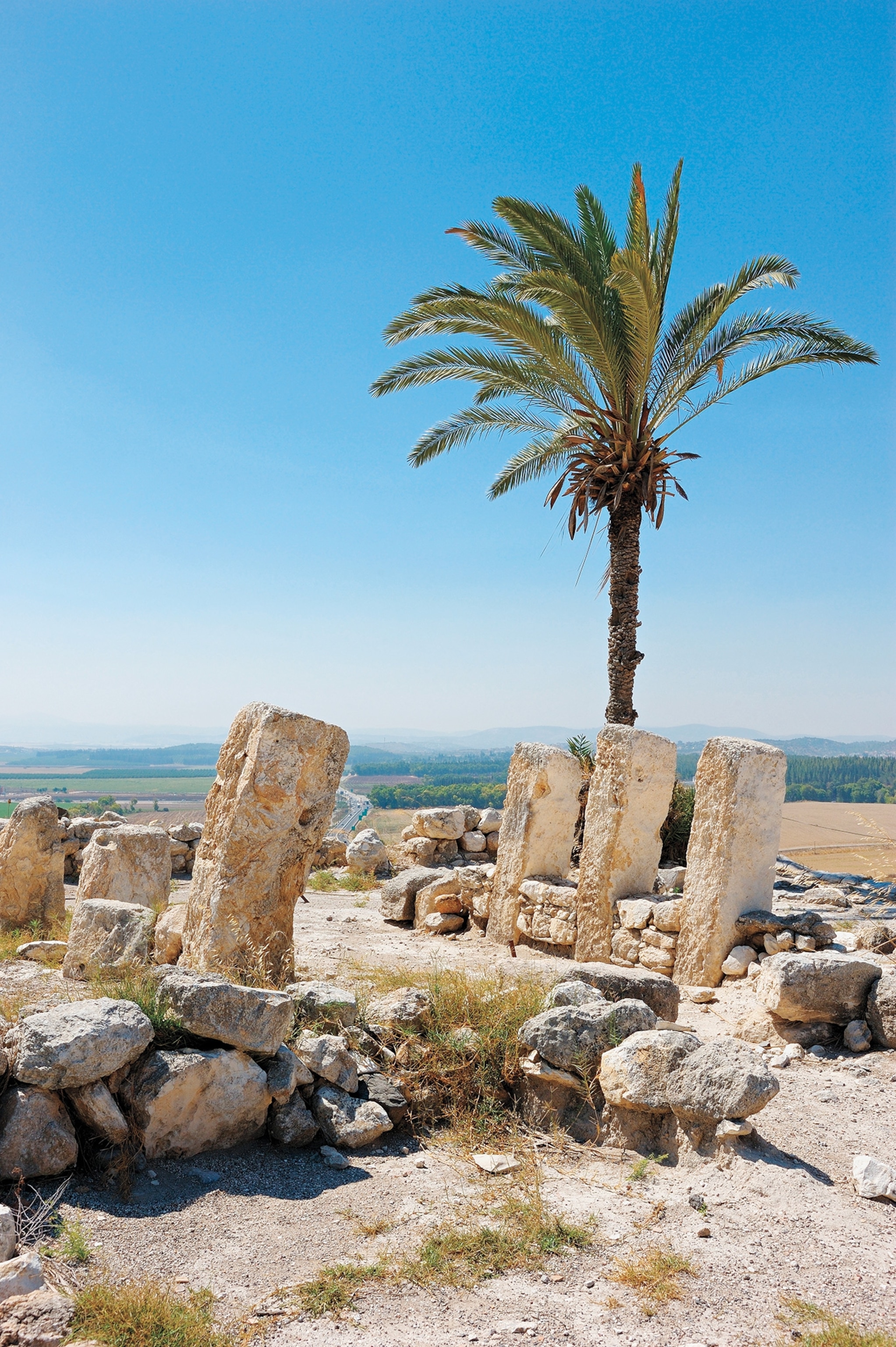 The remains of Megiddo overlook Israel’s Plain of Esdraelon.