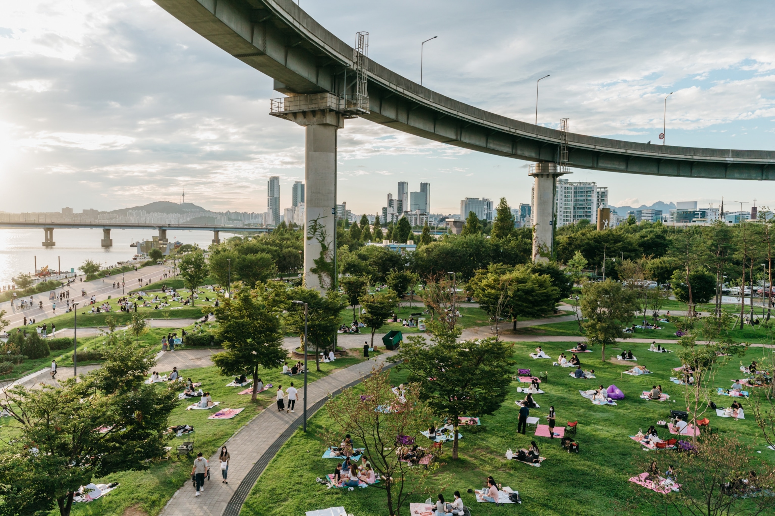 people relax in a park in Seoul