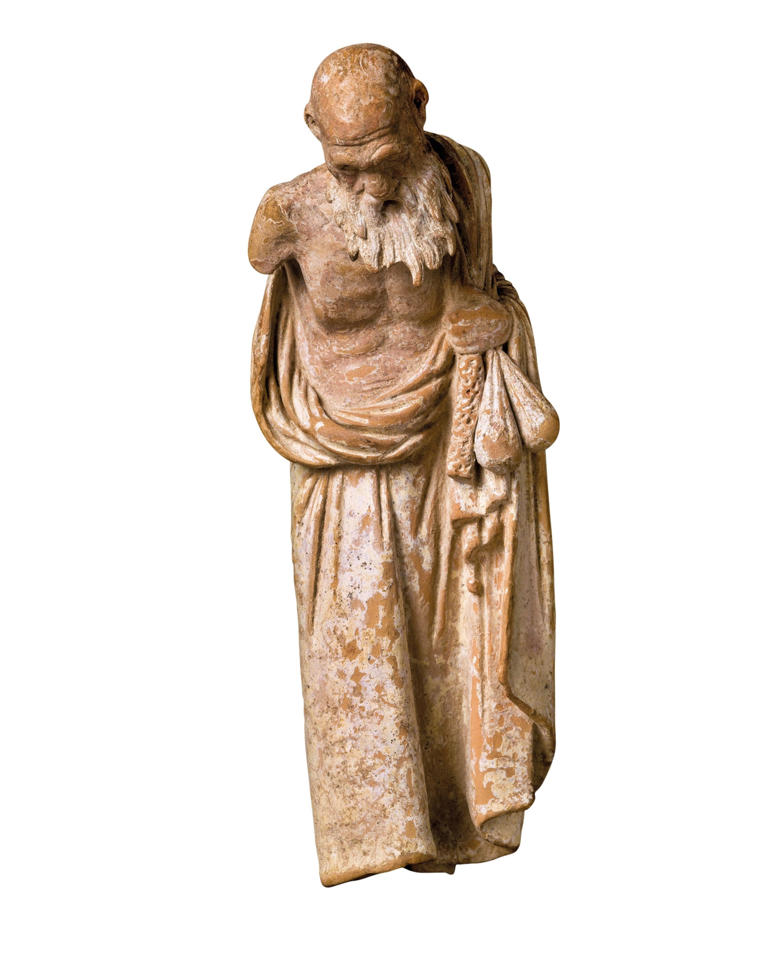 a terra cotta figurine of a paidagogos holding a bag of jacks