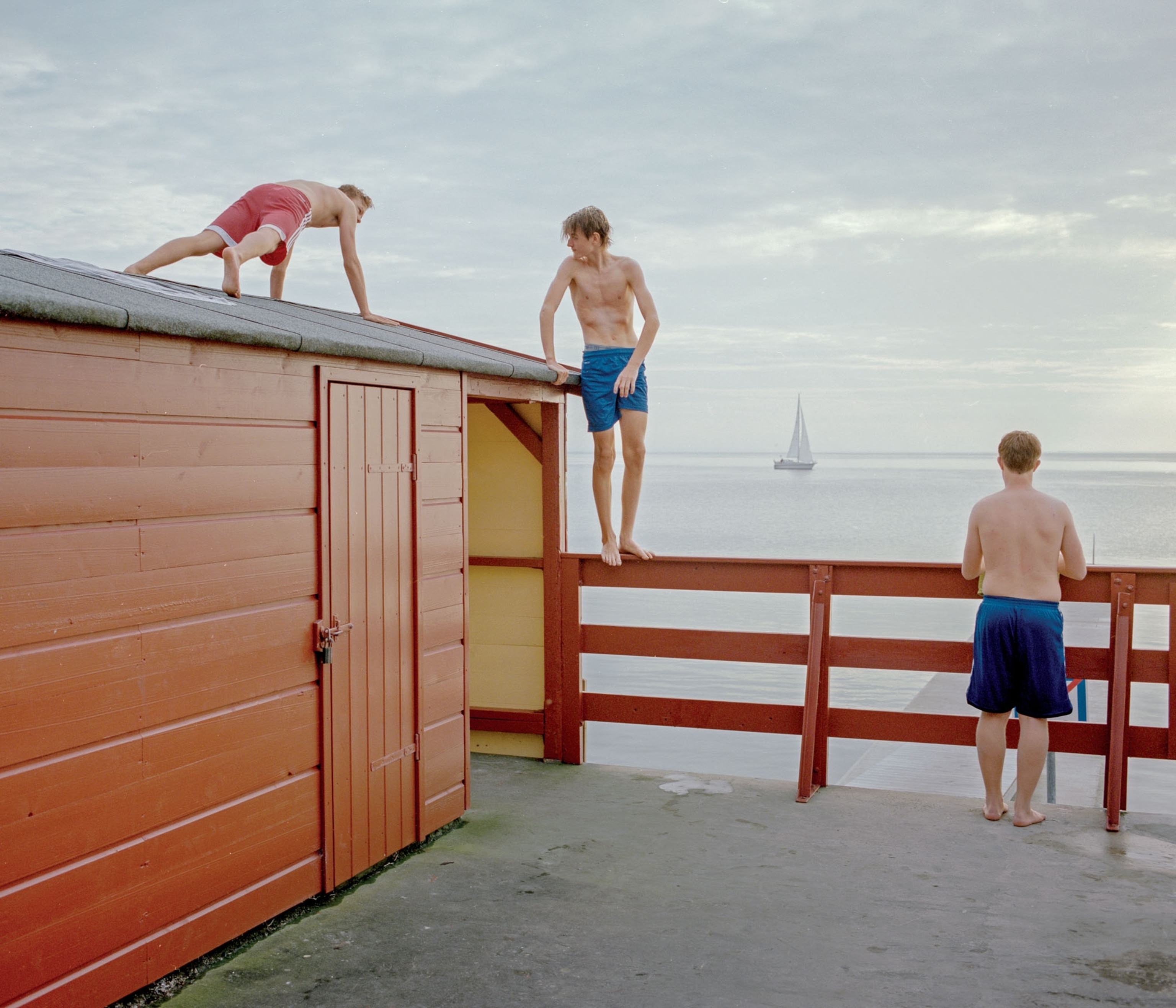 men on pier.