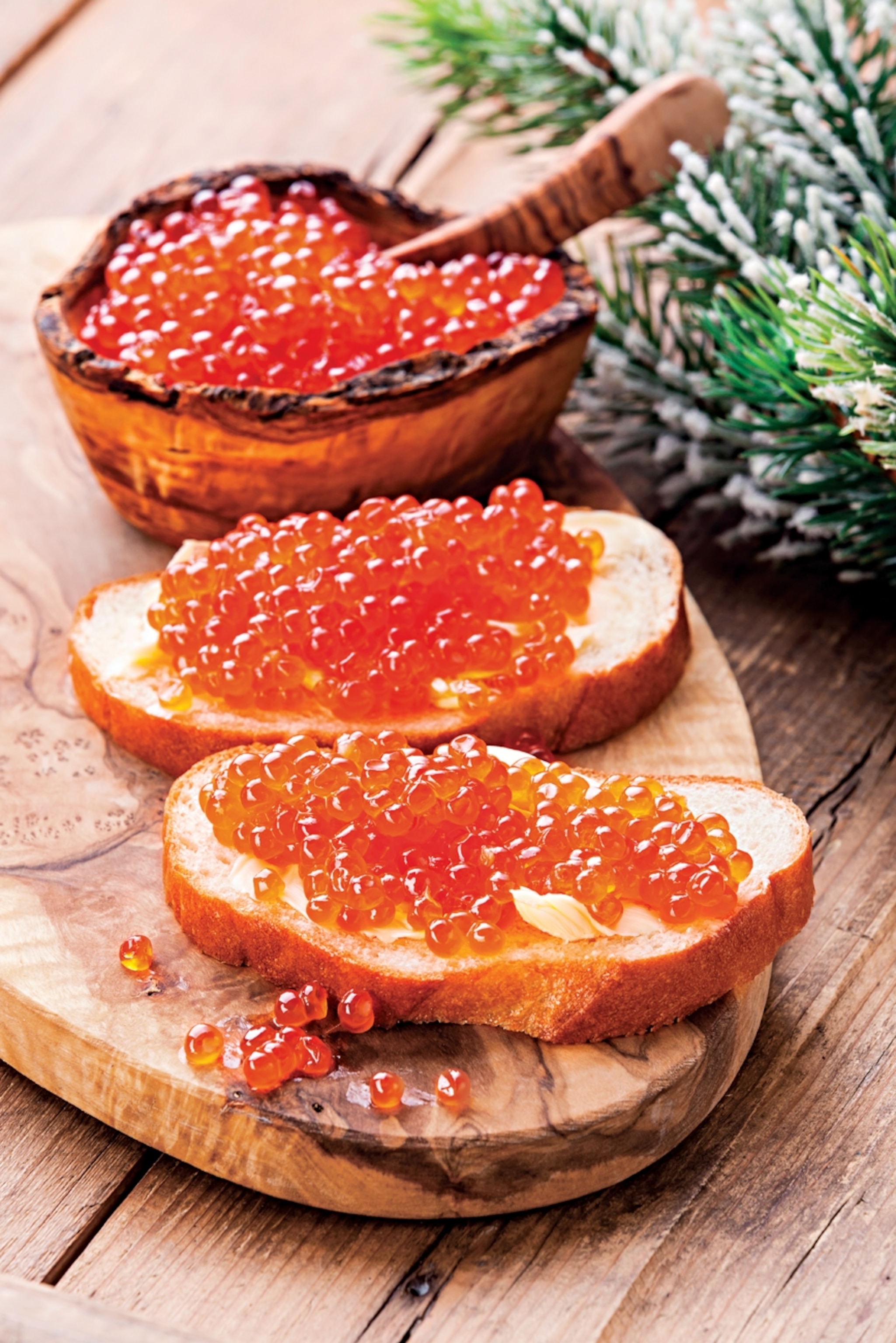 red caviar a staple of most menus, either on bread or folded into blini, or crepes