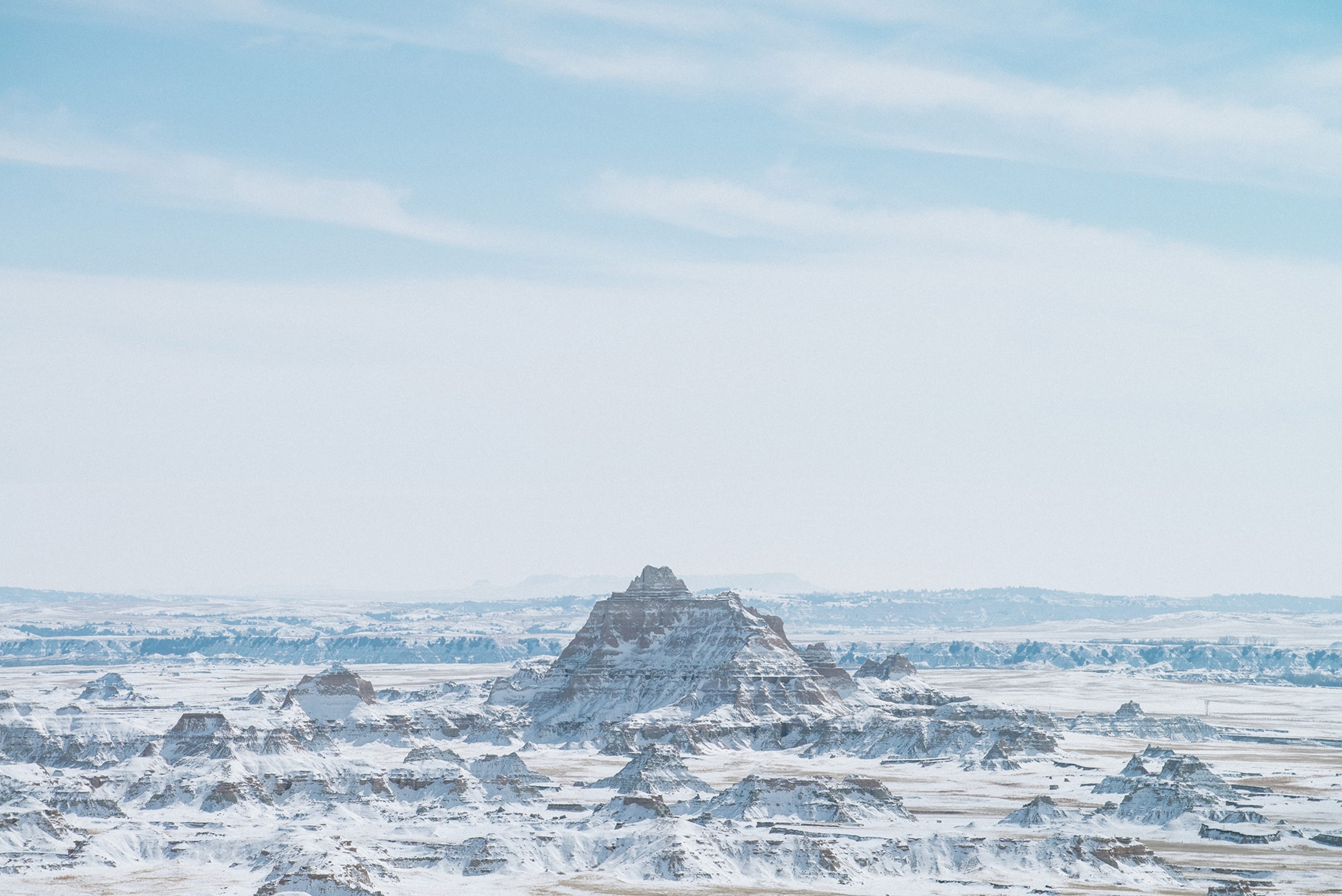 buttes in Badlands National Park in winter in South Dakota