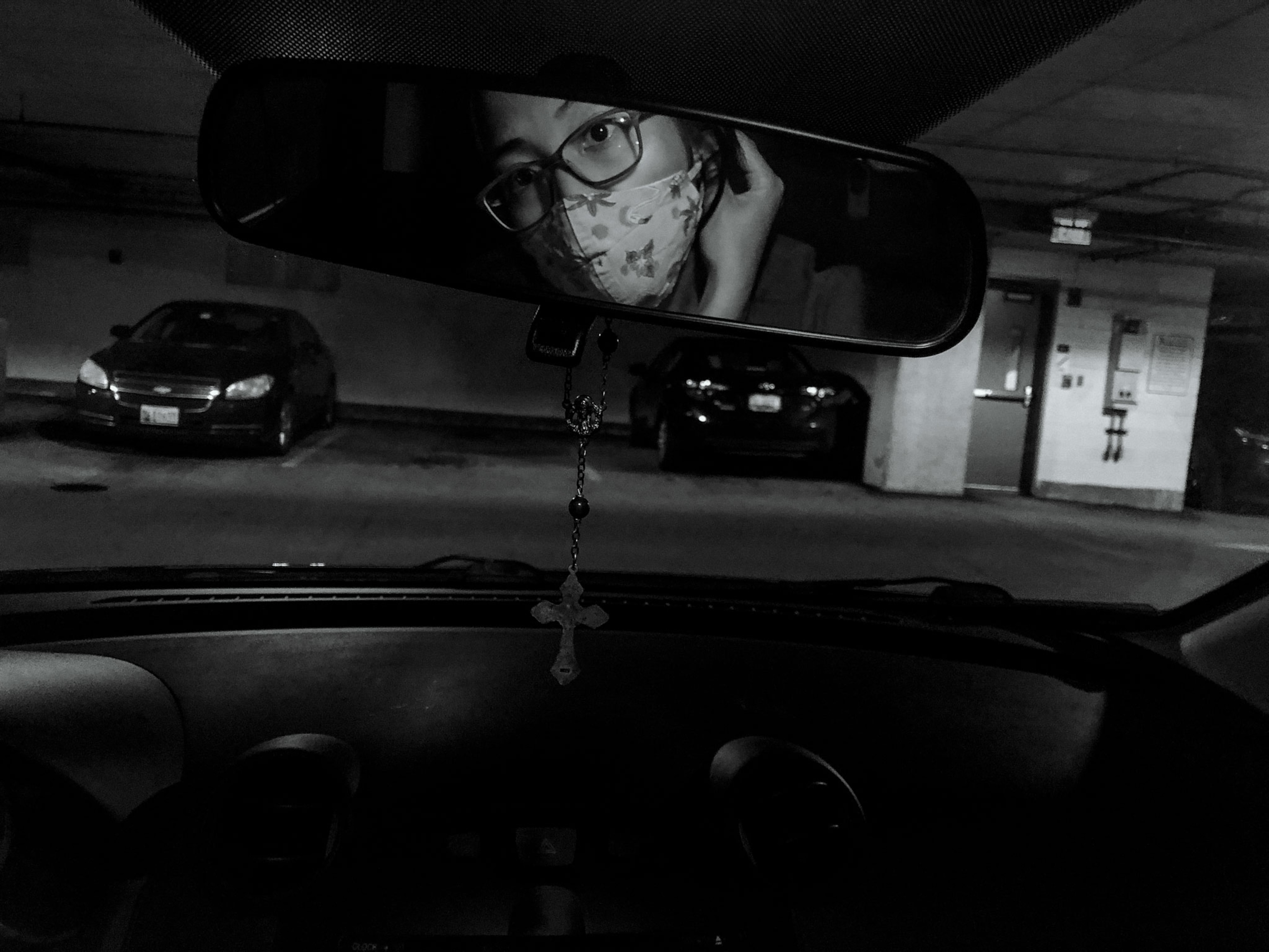 a nurse inside her car