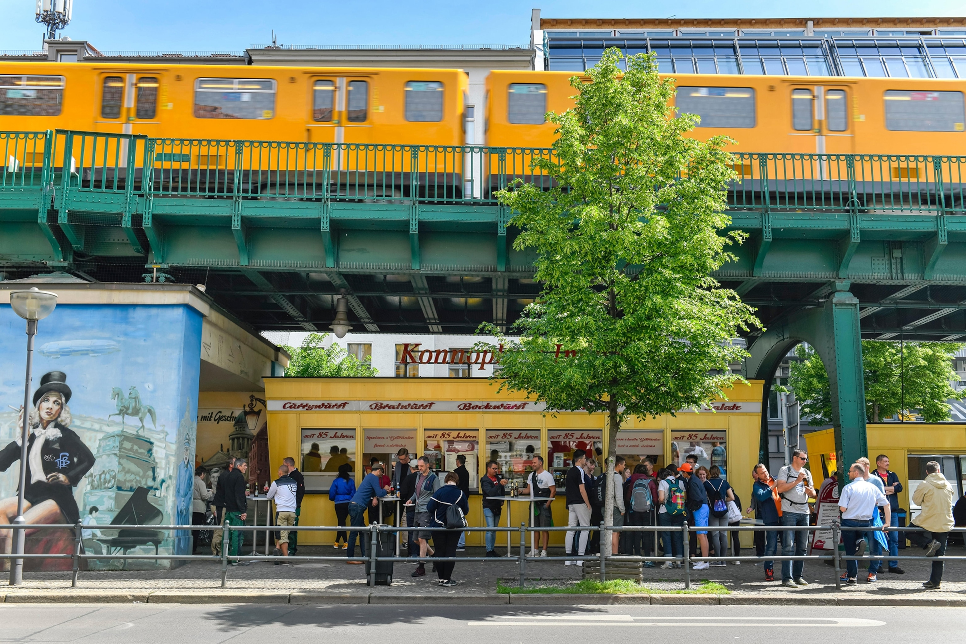 a food kiosk under a railway