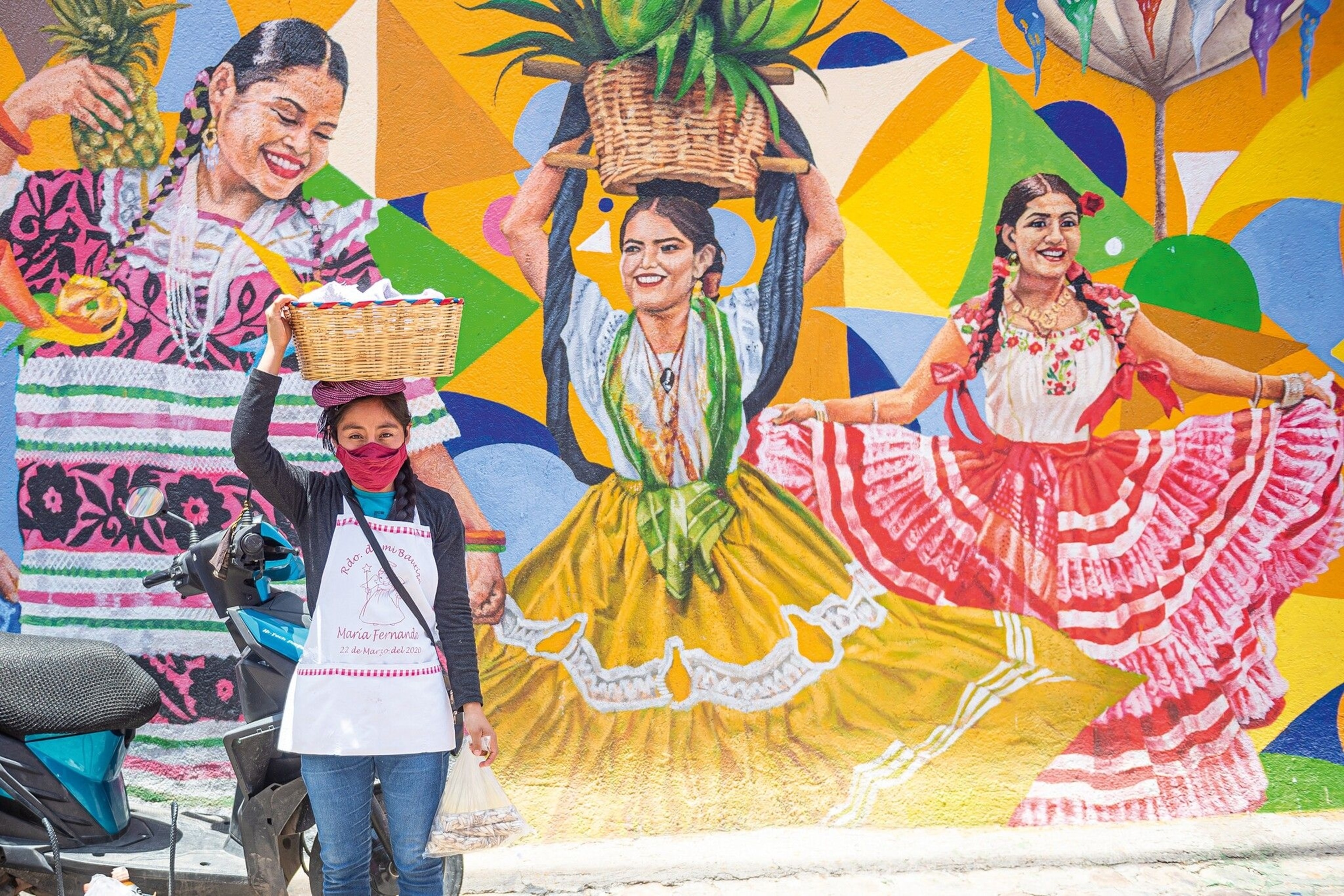 Maria Fernanda sells tamales with her mother around the quarter of Jalatlaco, which is famous for its beautiful murals and street art.