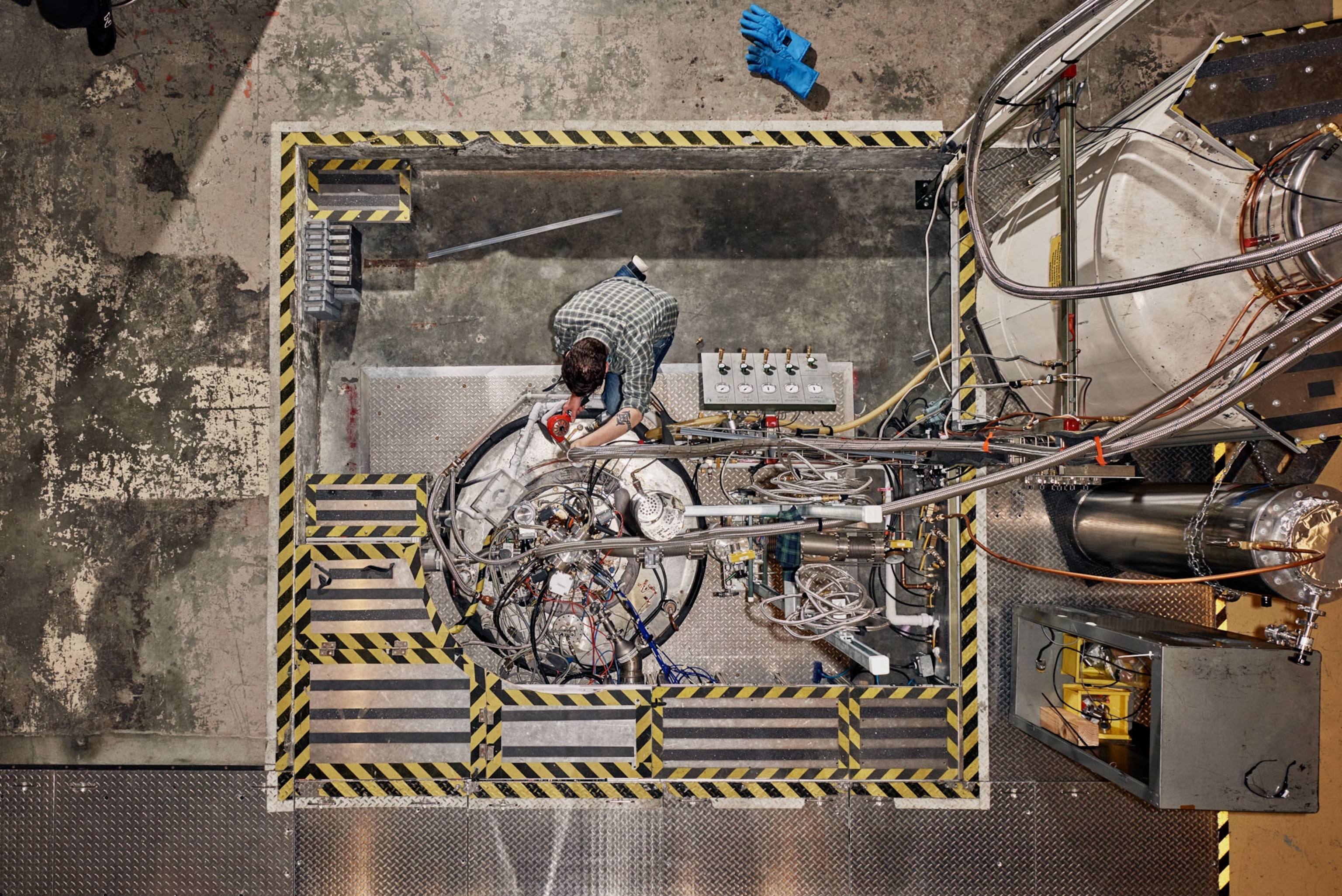 Nick Force, a research engineer, working with the main magnet in the lab.