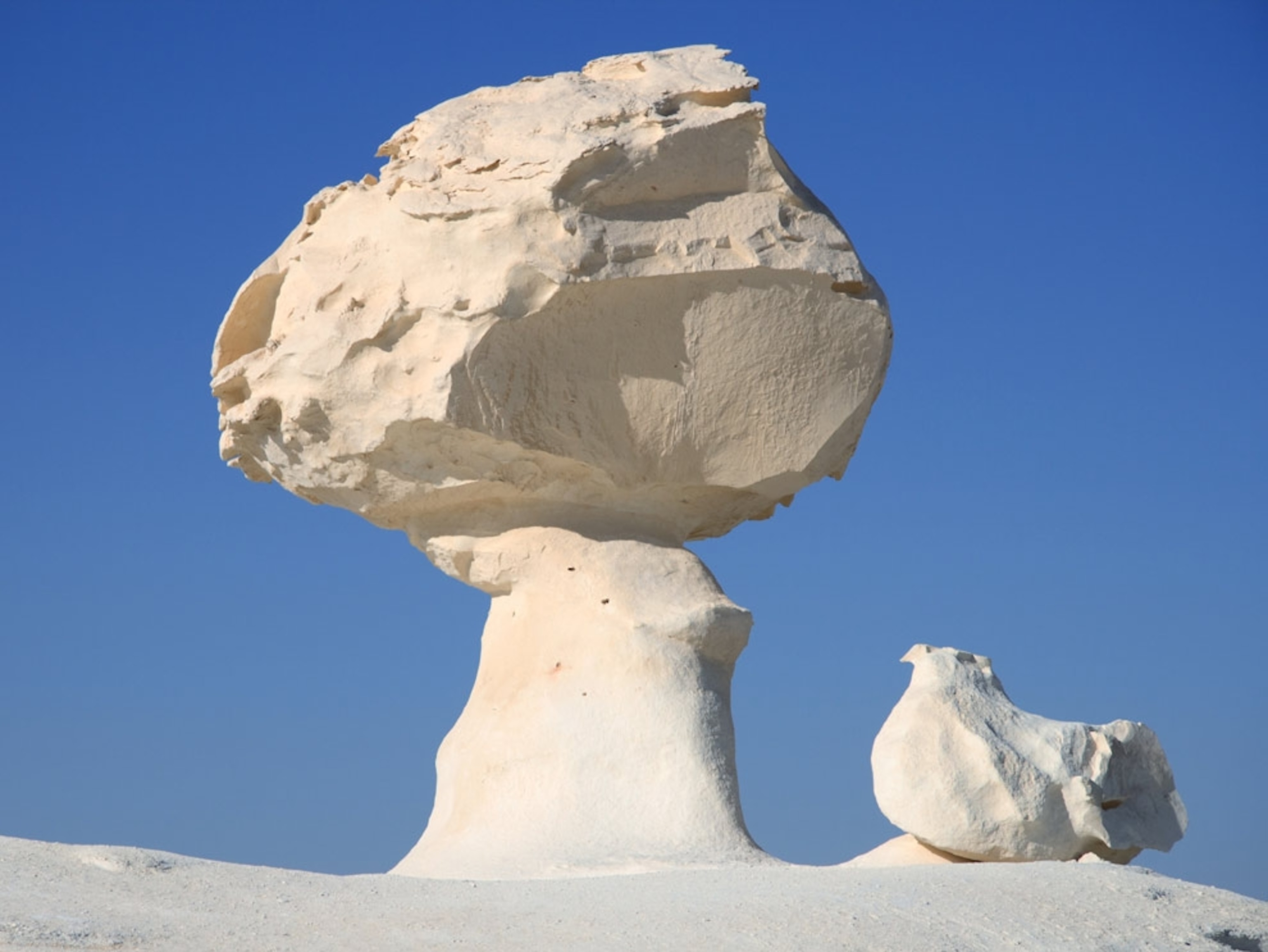 A white rock formation in the desert