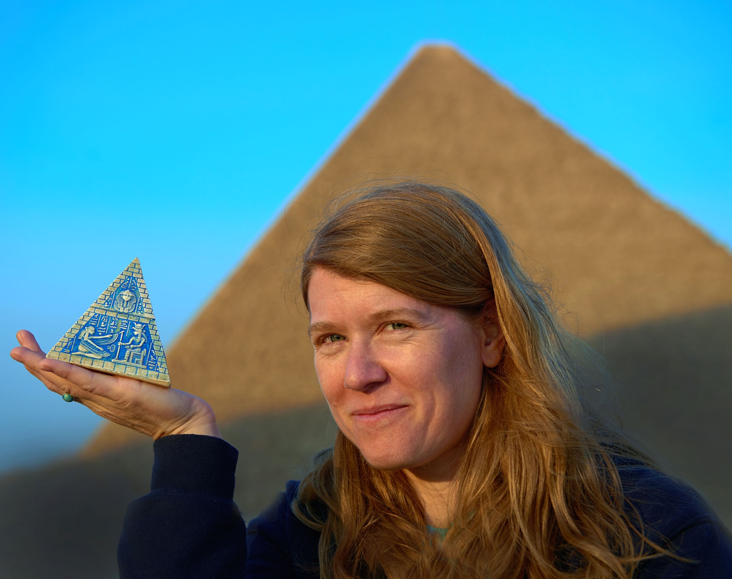Sarah Parcak in front of a pyramid