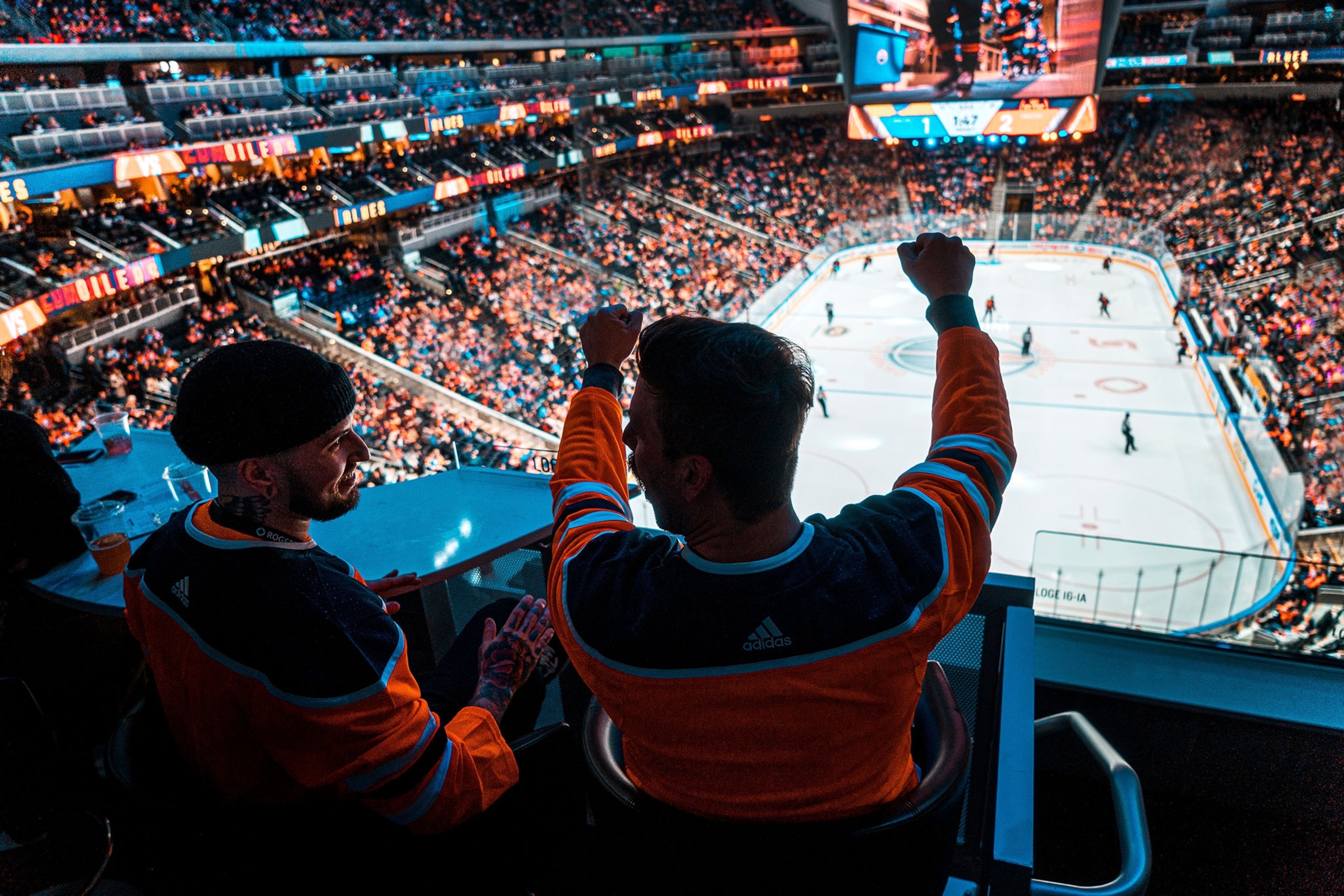 Fans cheer on the Edmonton Oilers from the stands at Rogers Place.