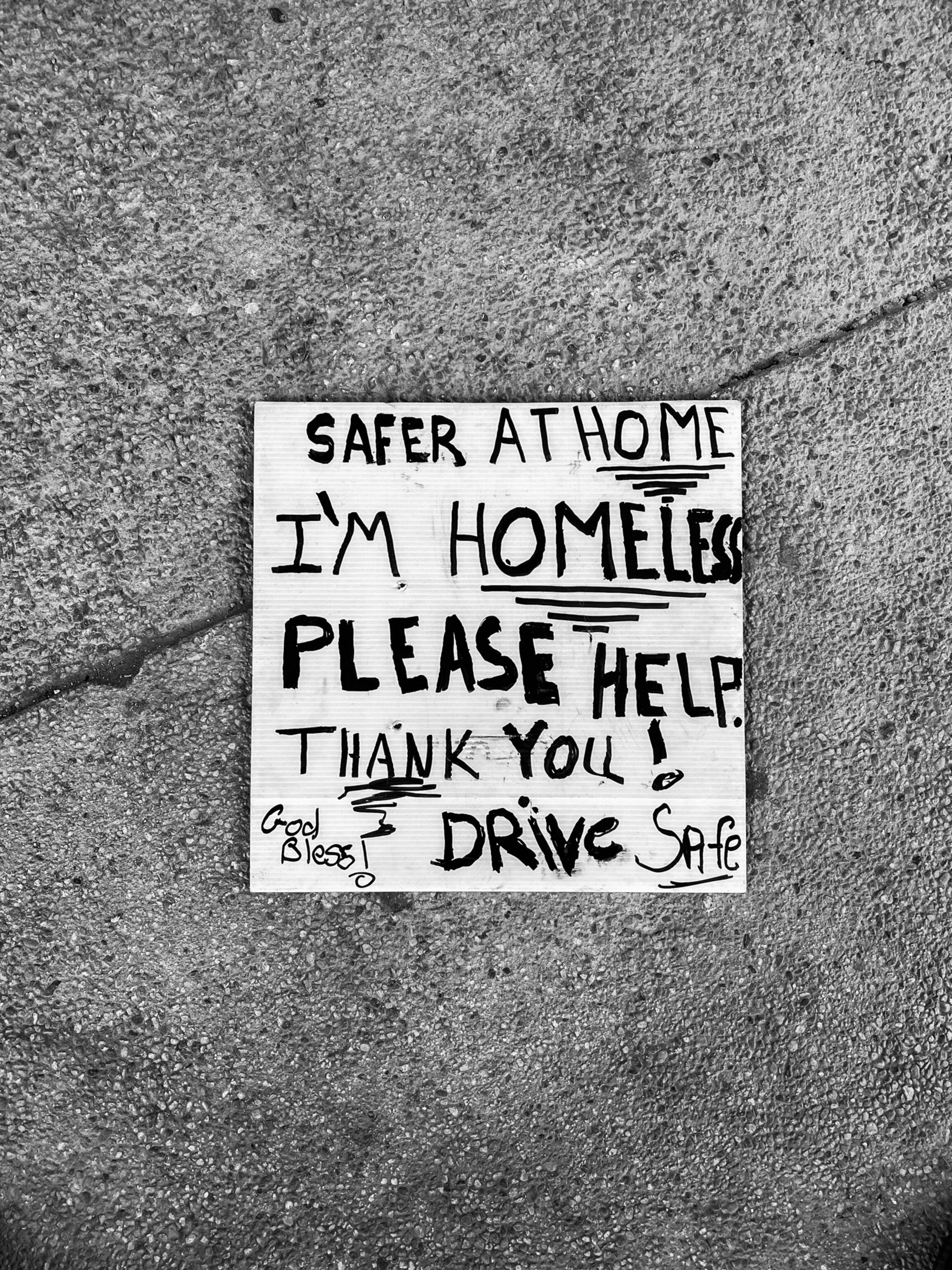 a sign that has pleas for help