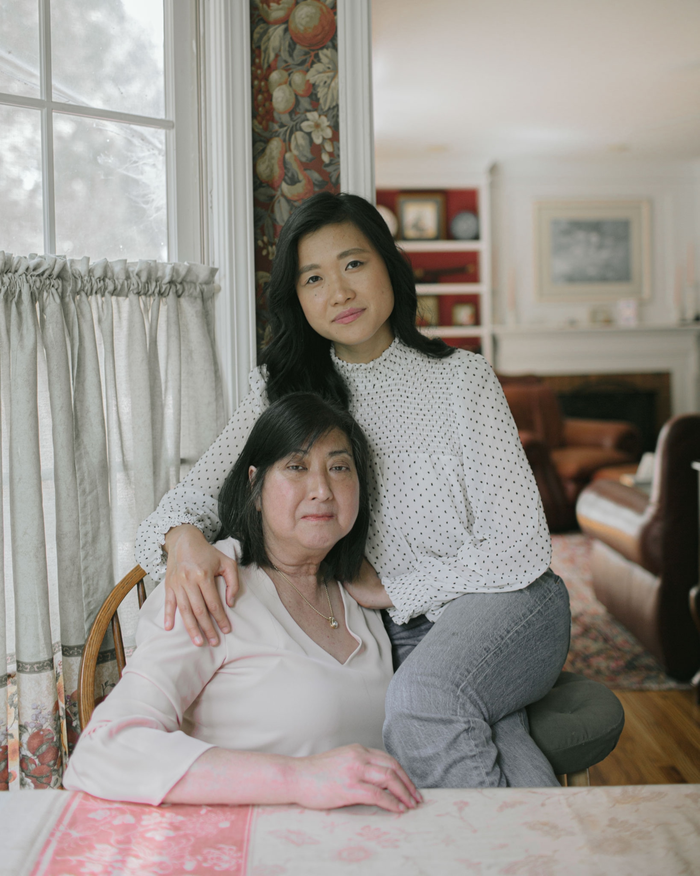 A woman and her mother pose for a portrait in Georgia