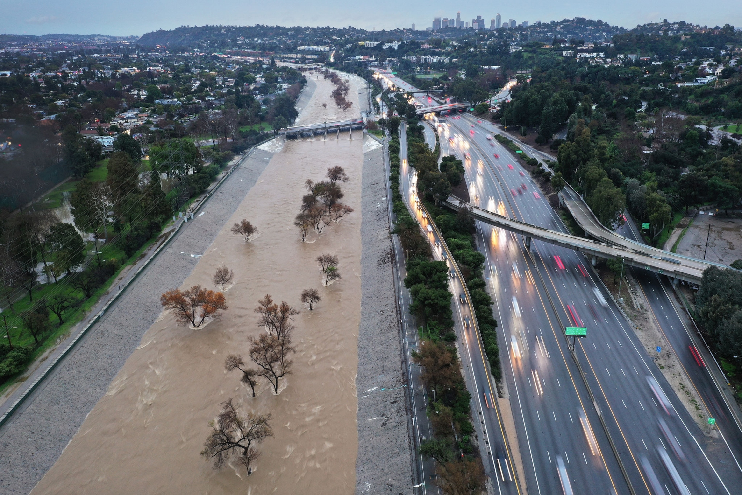 A flooded area next to a highway