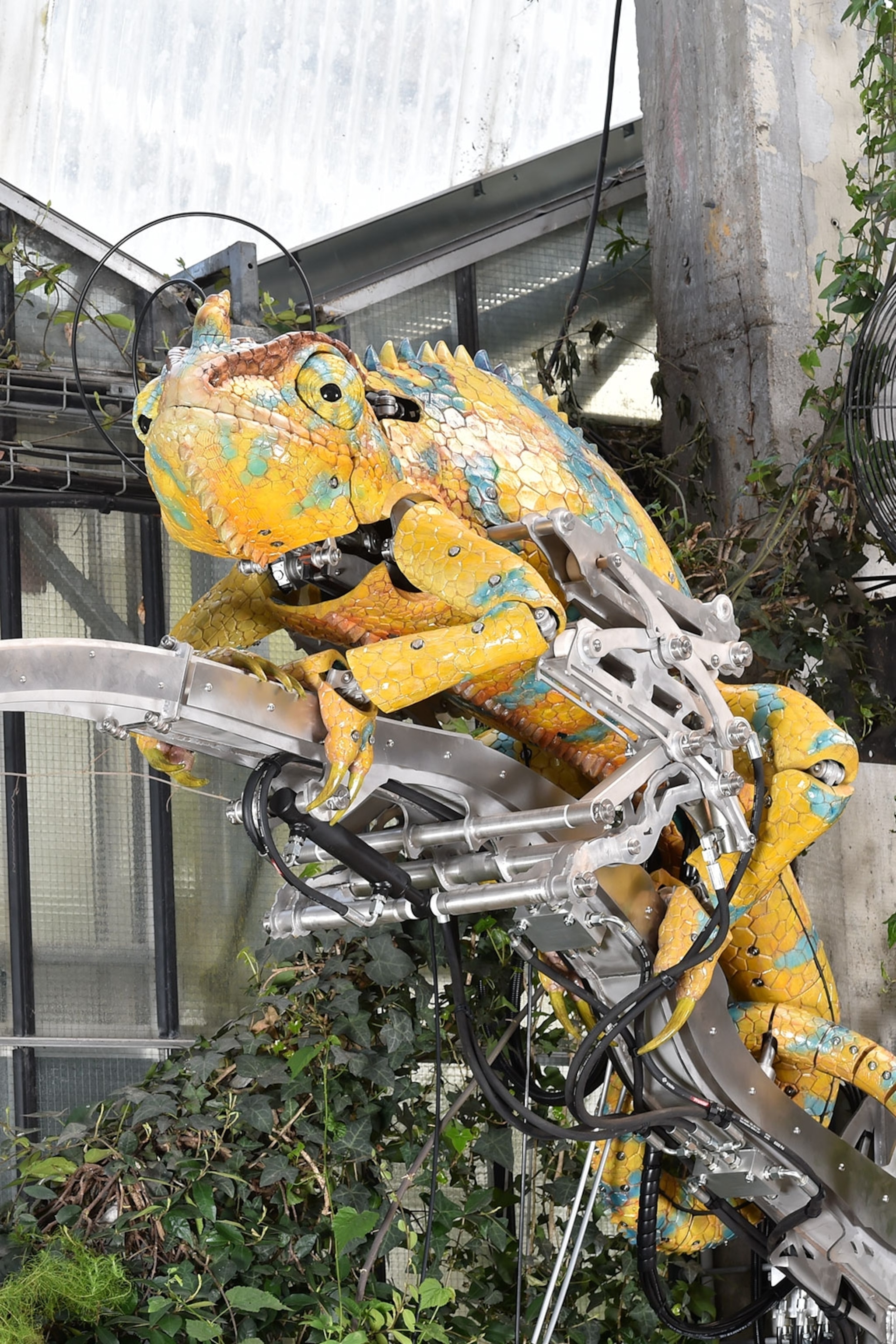 A mechanical yellow chameleon in the Galerie des Machines in Nantes, France.