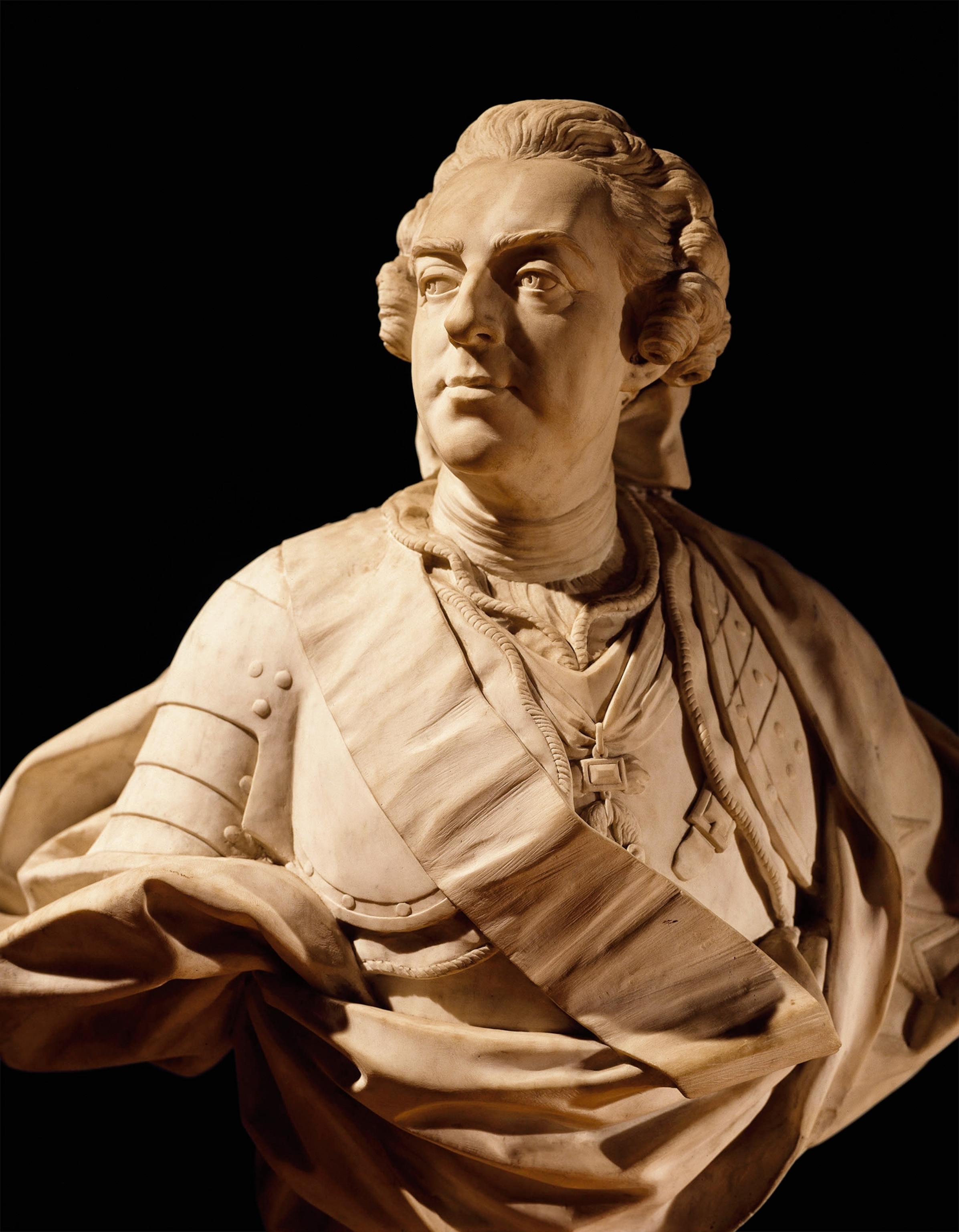 A bust of King Louis XV is housed in the Palace of Versailles.