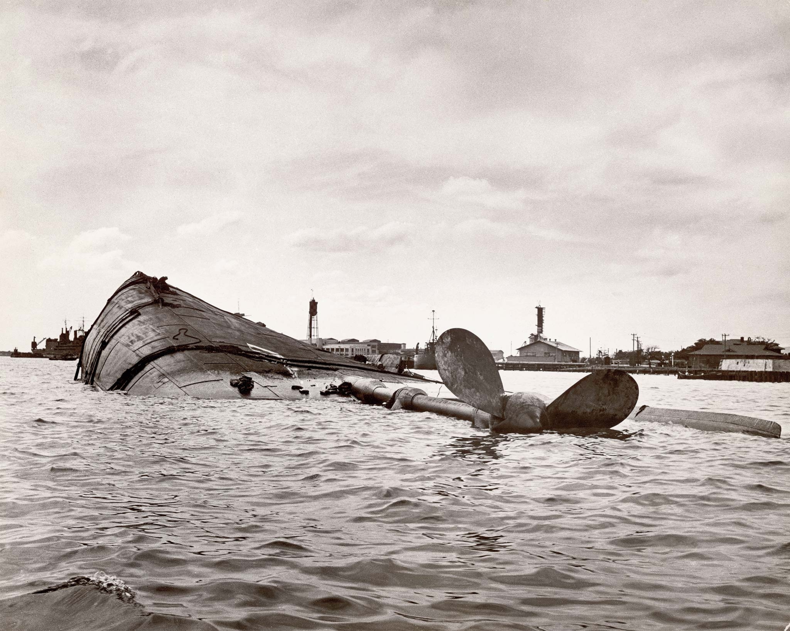 The Oklahoma ship is capsized in Pearl Harbor