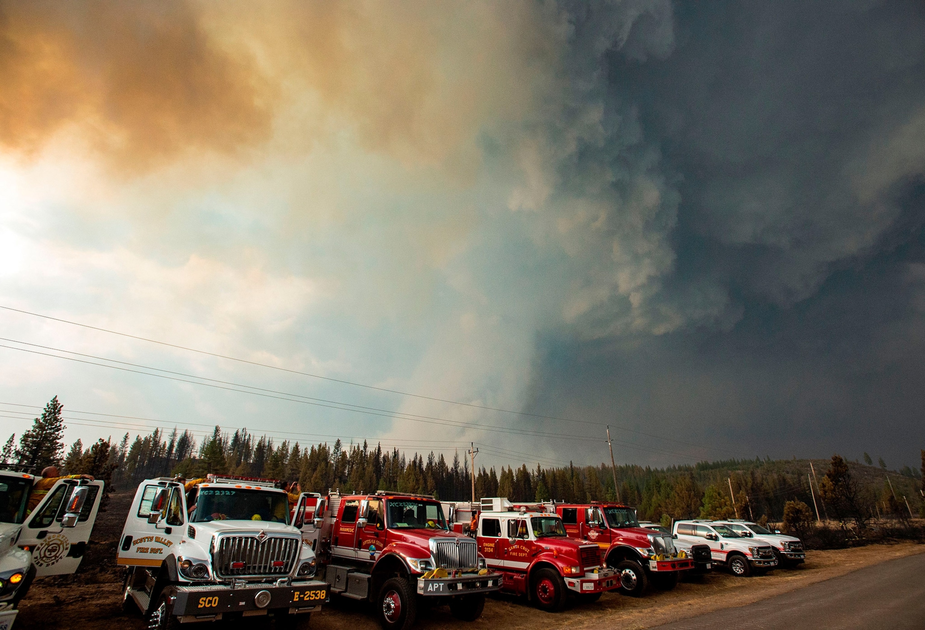 a thunderstorm cell drawing in smoke from the Hog fire in California